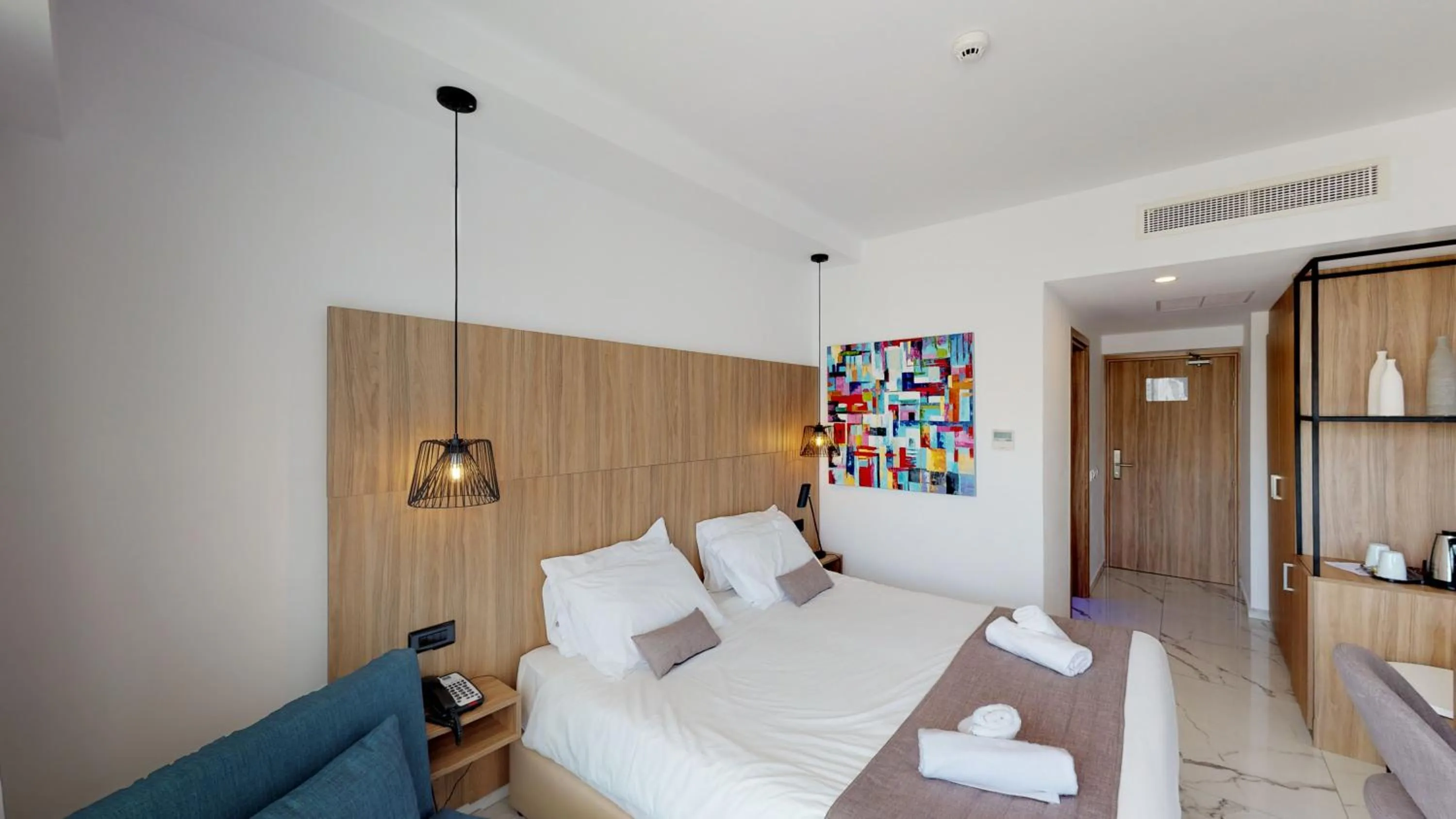 Bedroom, Bed in The Blue Ivy Hotel & Suites