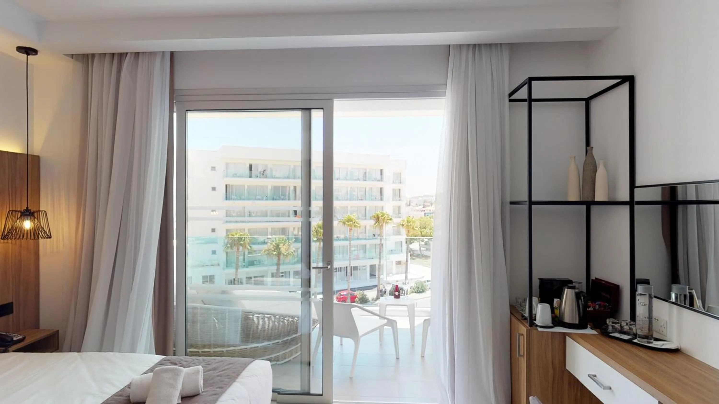 Bedroom, Bed in The Blue Ivy Hotel & Suites