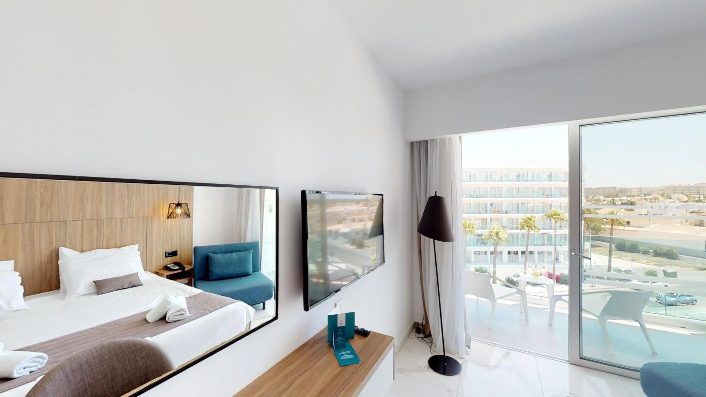 Bedroom, Bed in The Blue Ivy Hotel & Suites