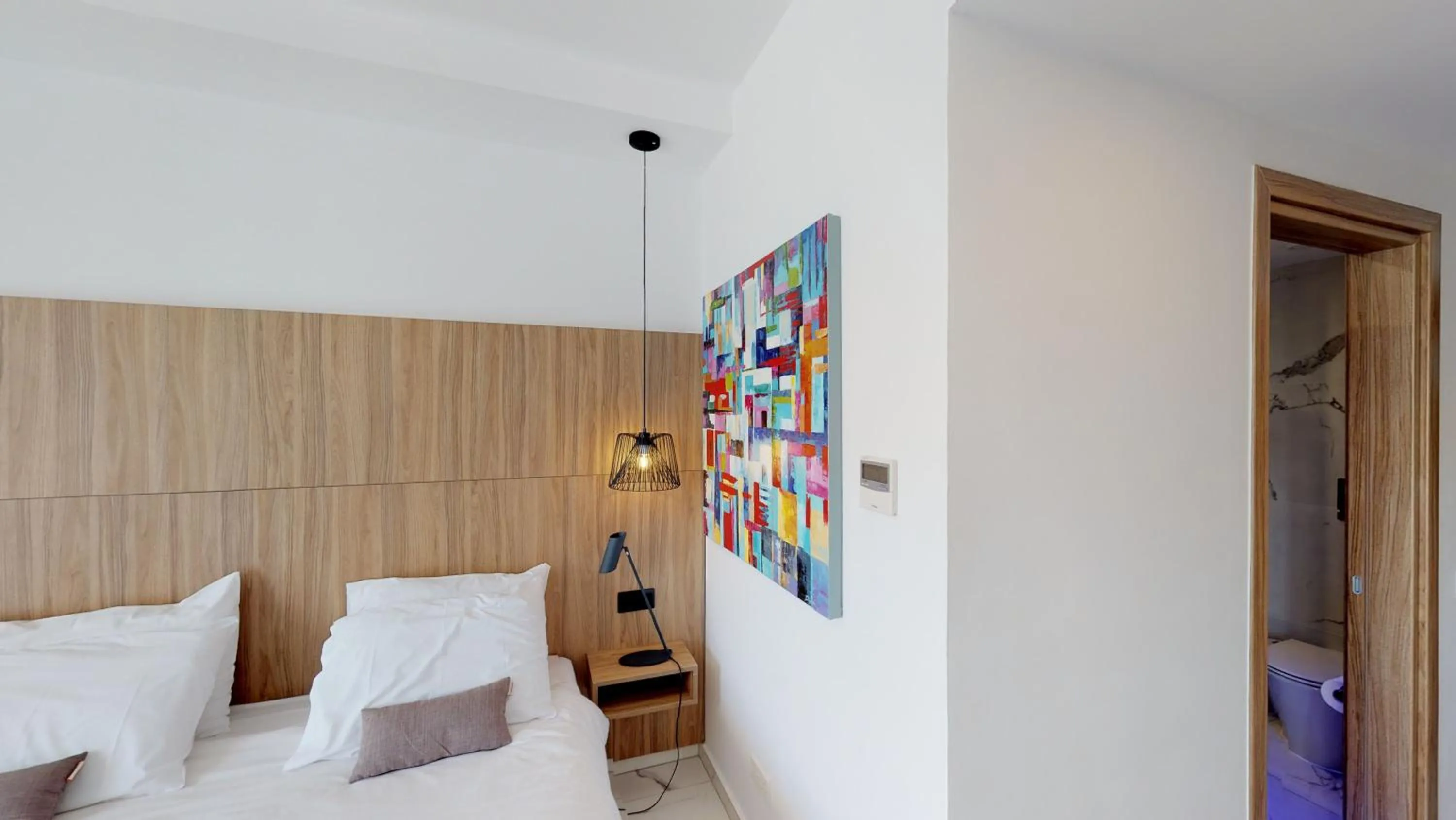 Bedroom, Bed in The Blue Ivy Hotel & Suites