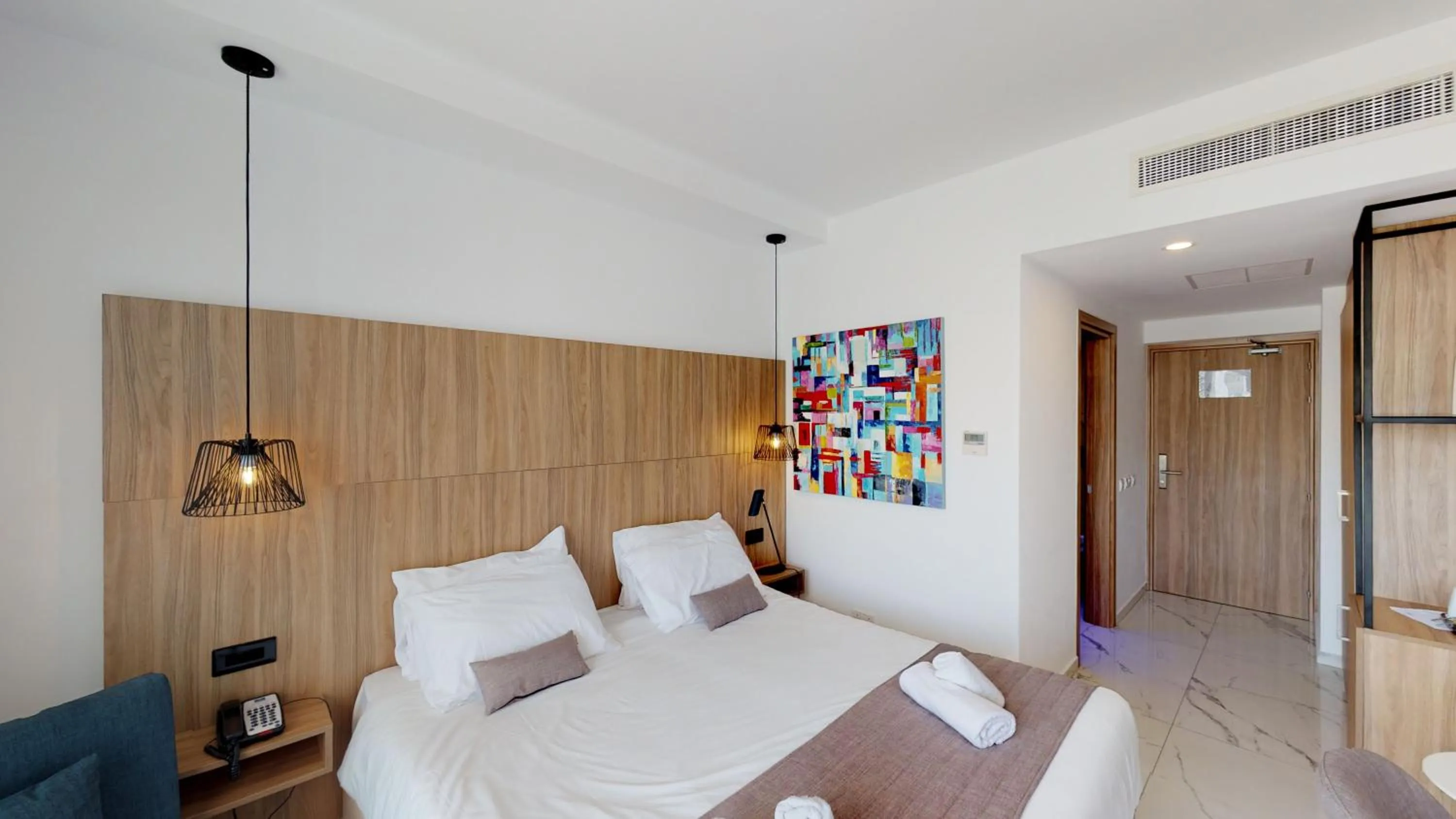 Bedroom, Bed in The Blue Ivy Hotel & Suites