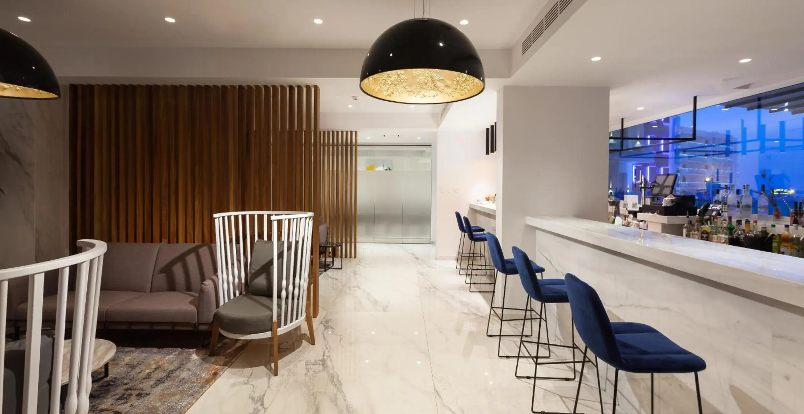 Lounge or bar in The Blue Ivy Hotel & Suites Lounge or bar in The Blue Ivy Hotel & Suites