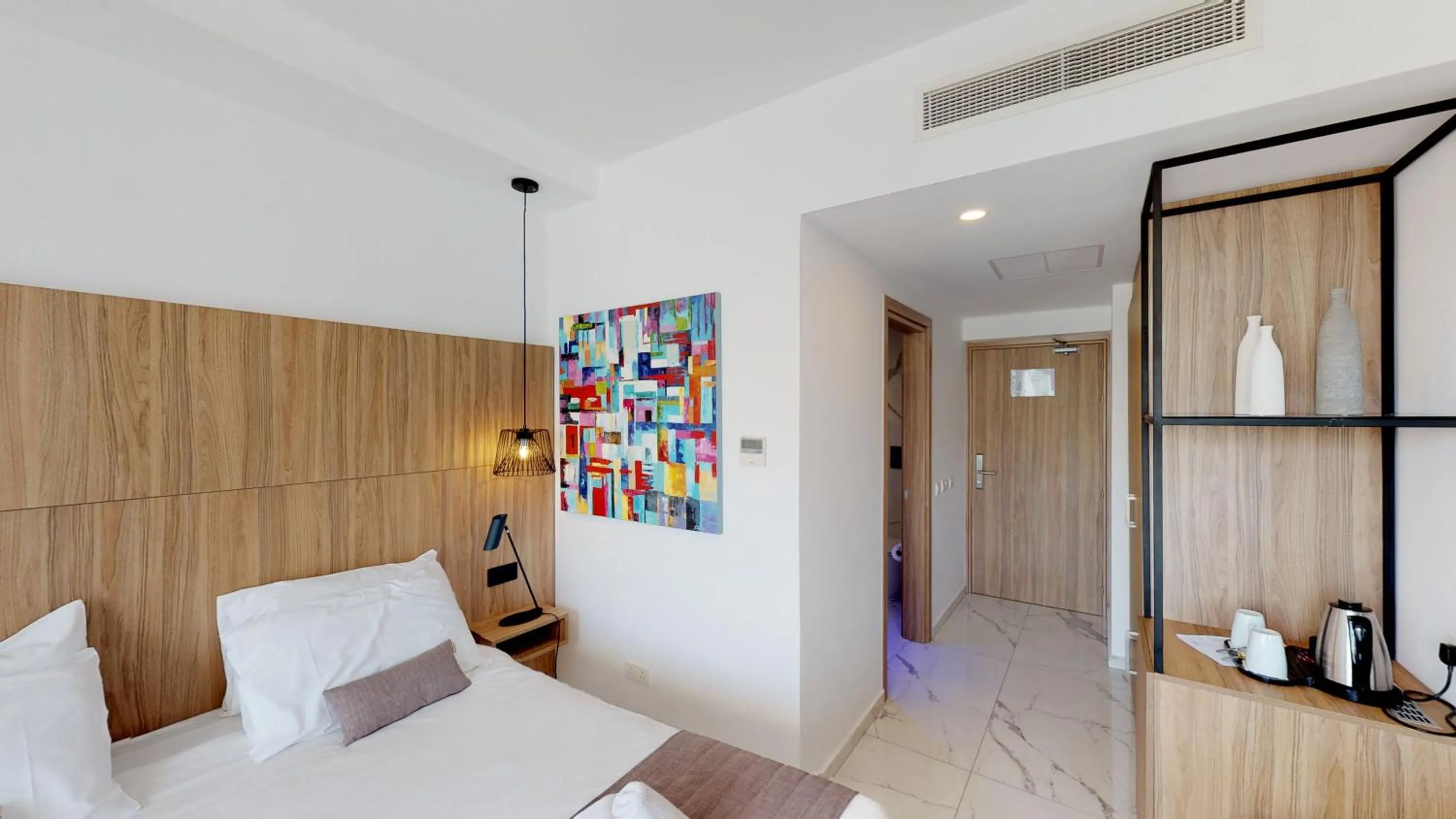 Bedroom, Bed in The Blue Ivy Hotel & Suites