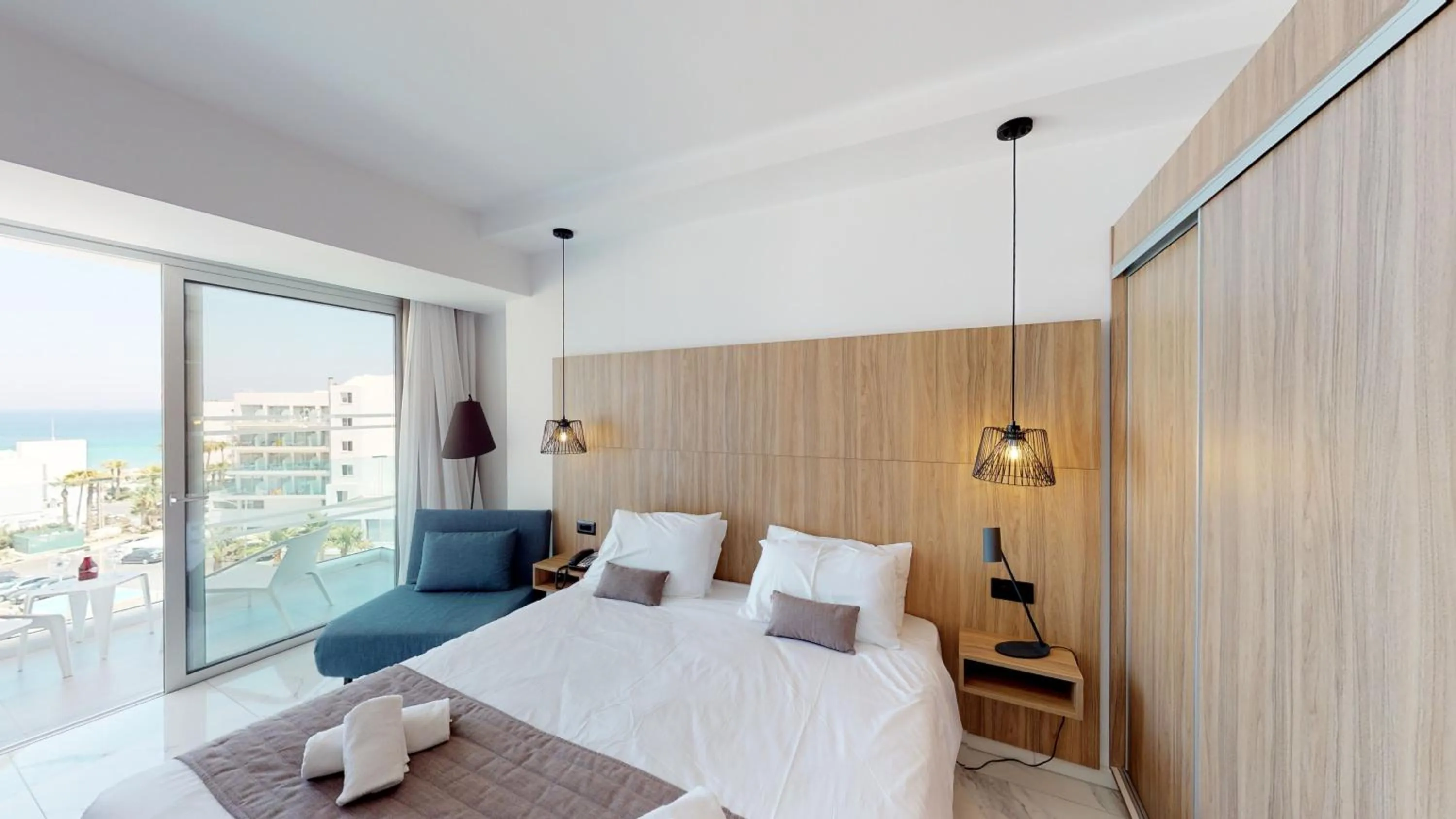 Bedroom, Bed in The Blue Ivy Hotel & Suites