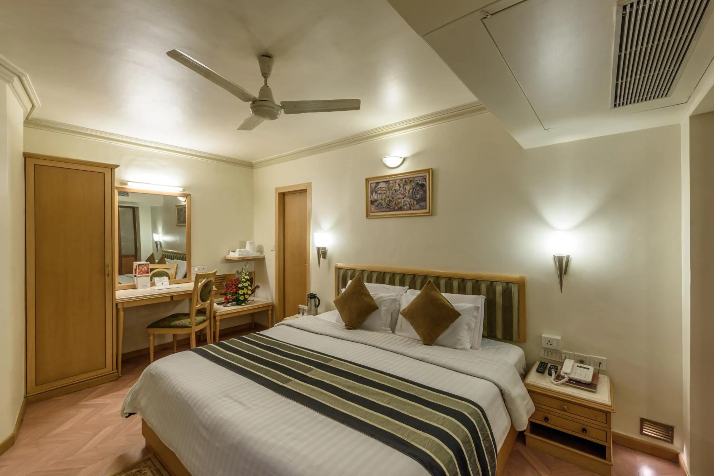 Bedroom, Bed in Comfort Inn President Near Ahmedabad Junction Station