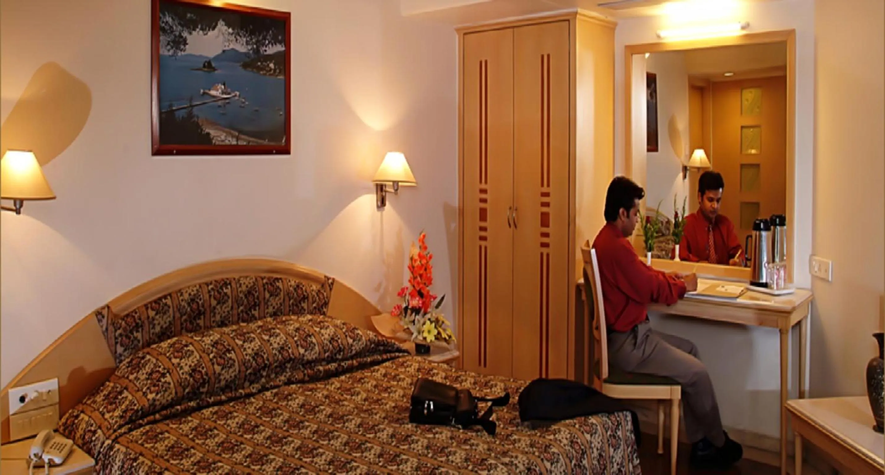 Bedroom in Comfort Inn President Near Ahmedabad Junction Station