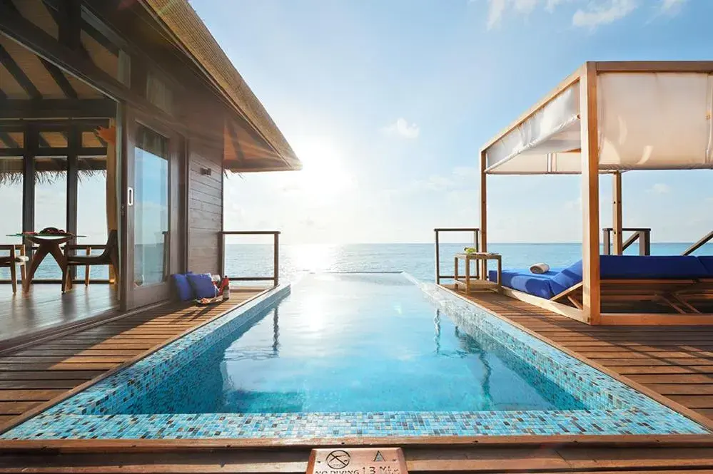 Pool view in Coco Bodu Hithi - 50 percent off shared roundtrip Speedboat for stays from 1 Sep to 23 Dec 2025 Pool view in Coco Bodu Hithi - 50 percent off shared roundtrip Speedboat for stays from 1 Sep to 23 Dec 2025