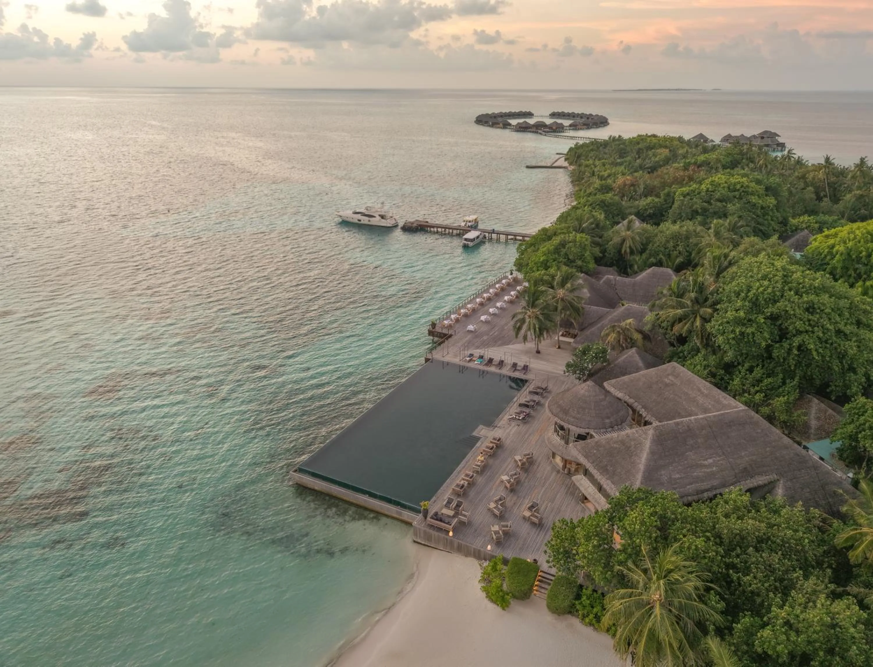 Property building in Coco Bodu Hithi - 50 percent off shared roundtrip Speedboat for stays from 1 Sep to 23 Dec 2025