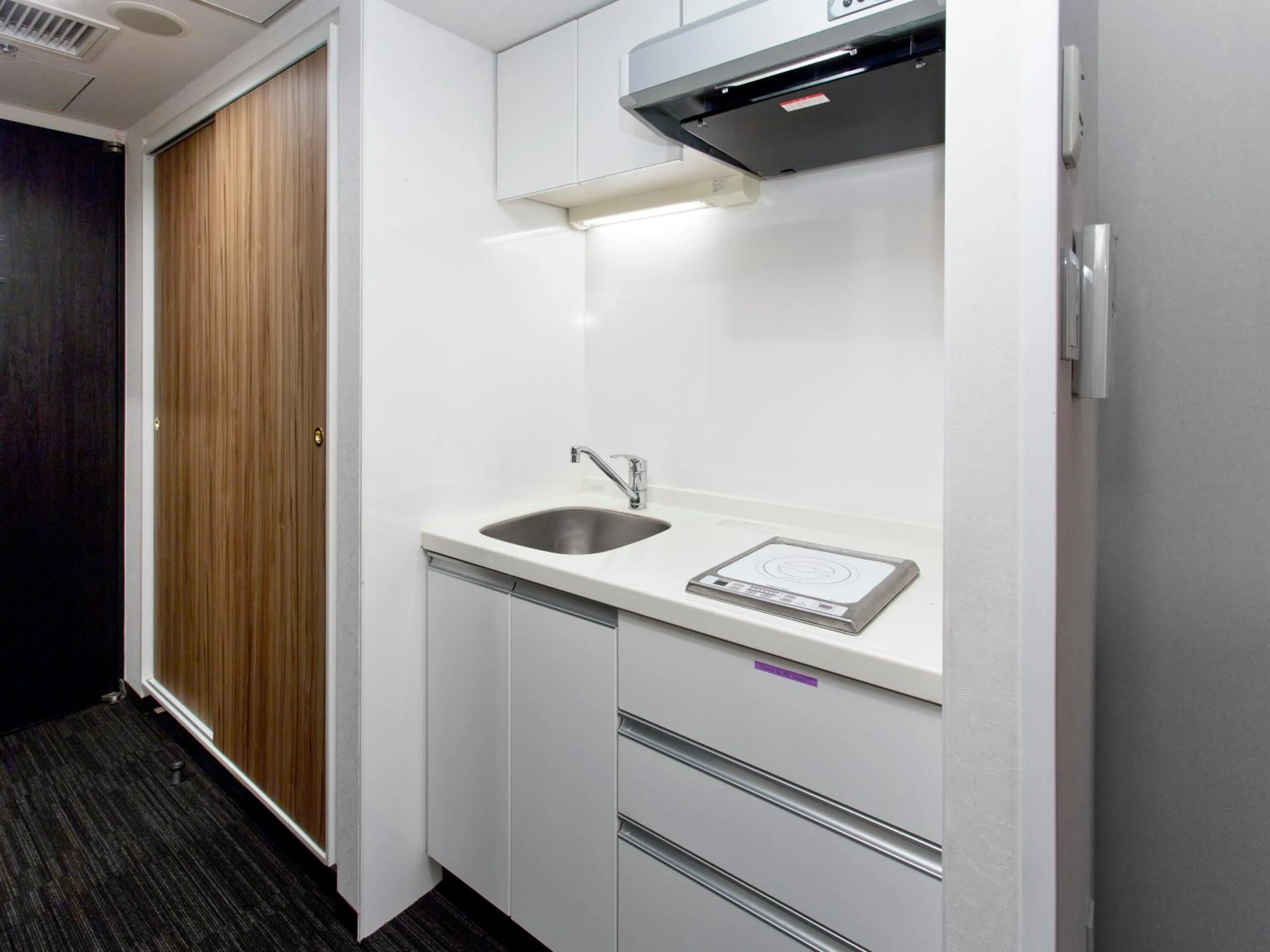 Kitchen or kitchenette in Hundred Stay Tokyo Shinjuku