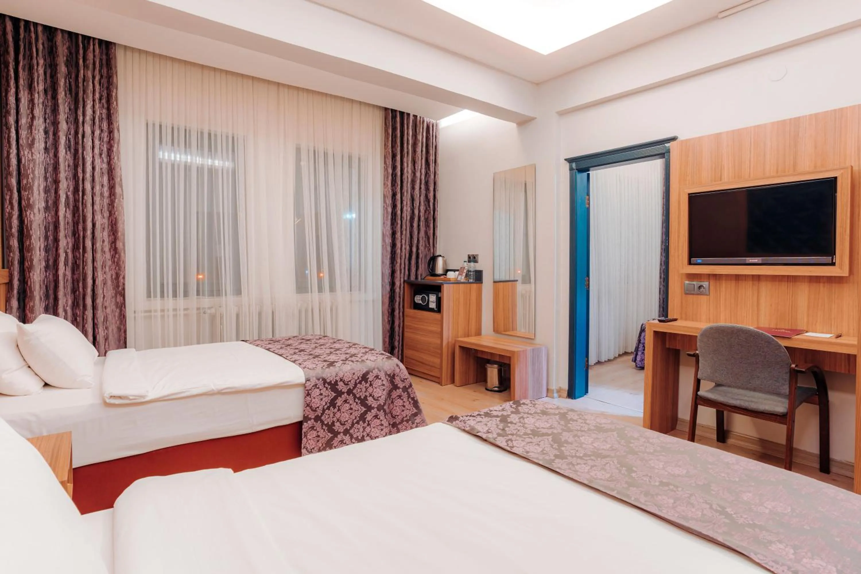 Bed in Aksular Hotel