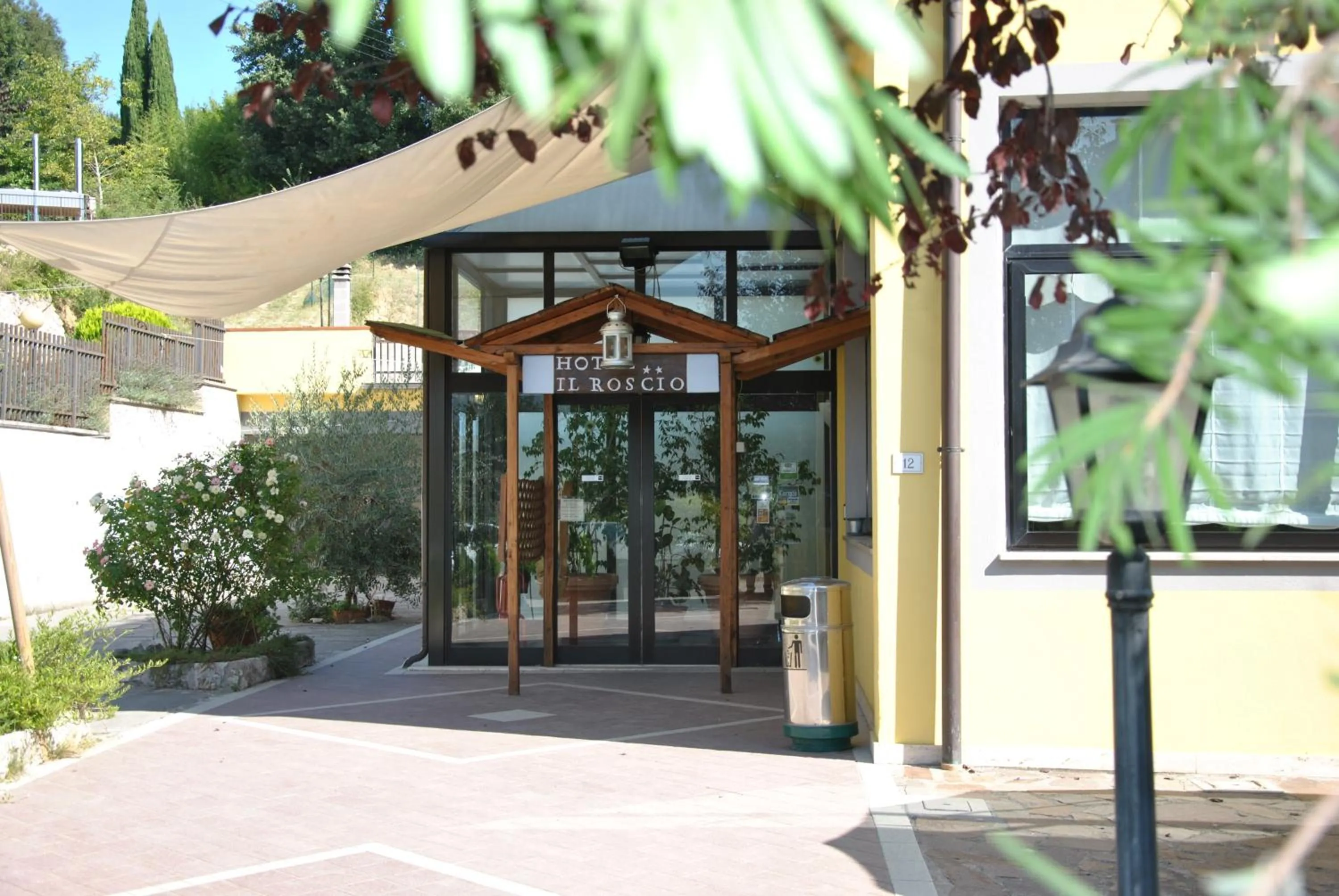 Property logo or sign in Hotel Il Roscio