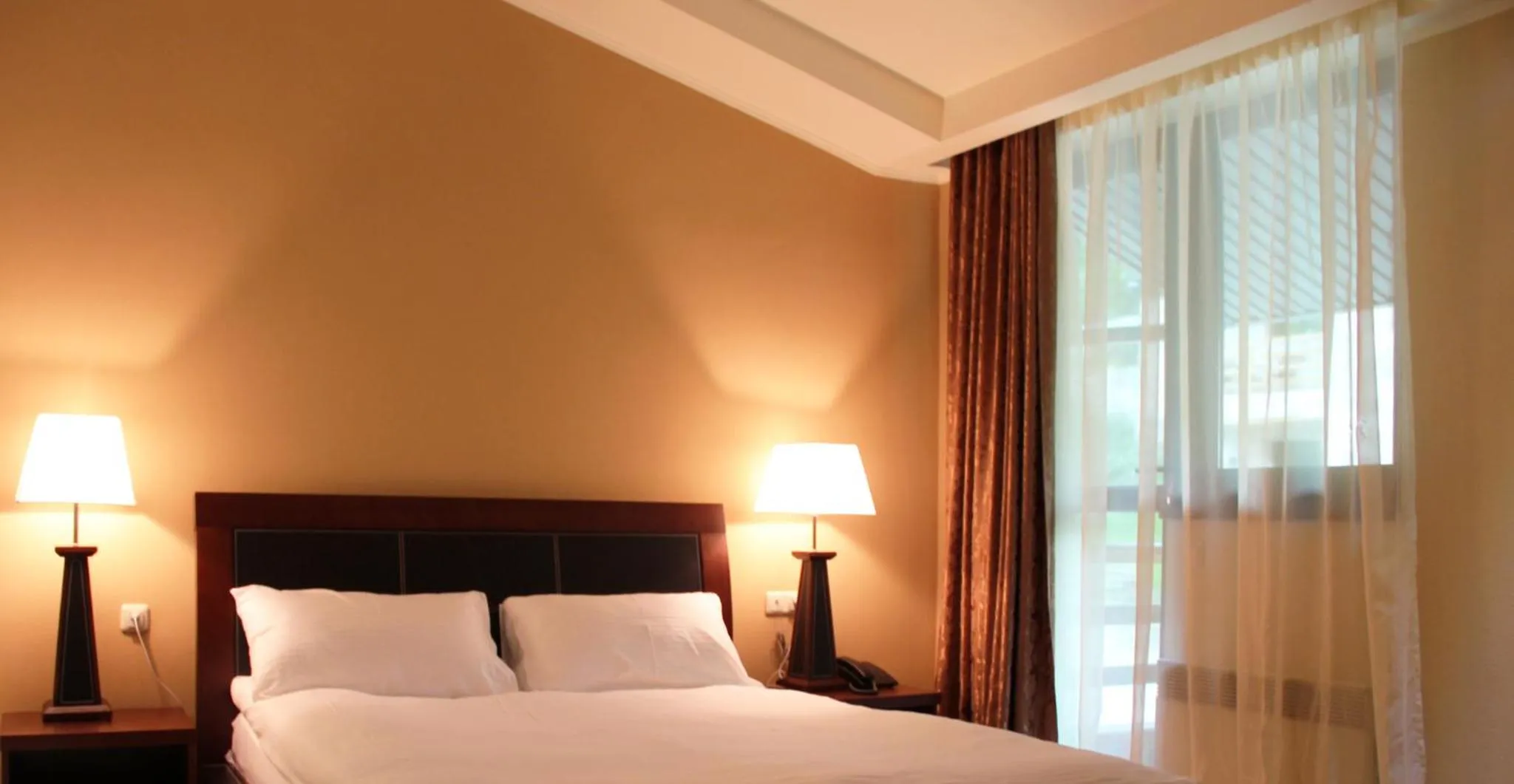 Bed in Dilijan Park Resort & Villas