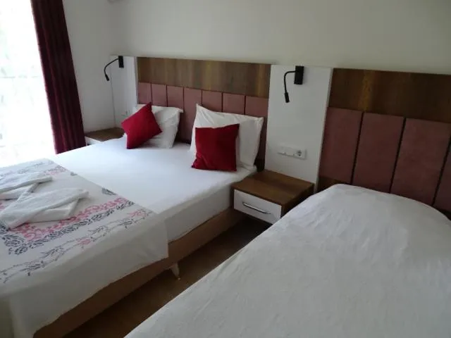 Bed in Arikanda River Garden Hotel