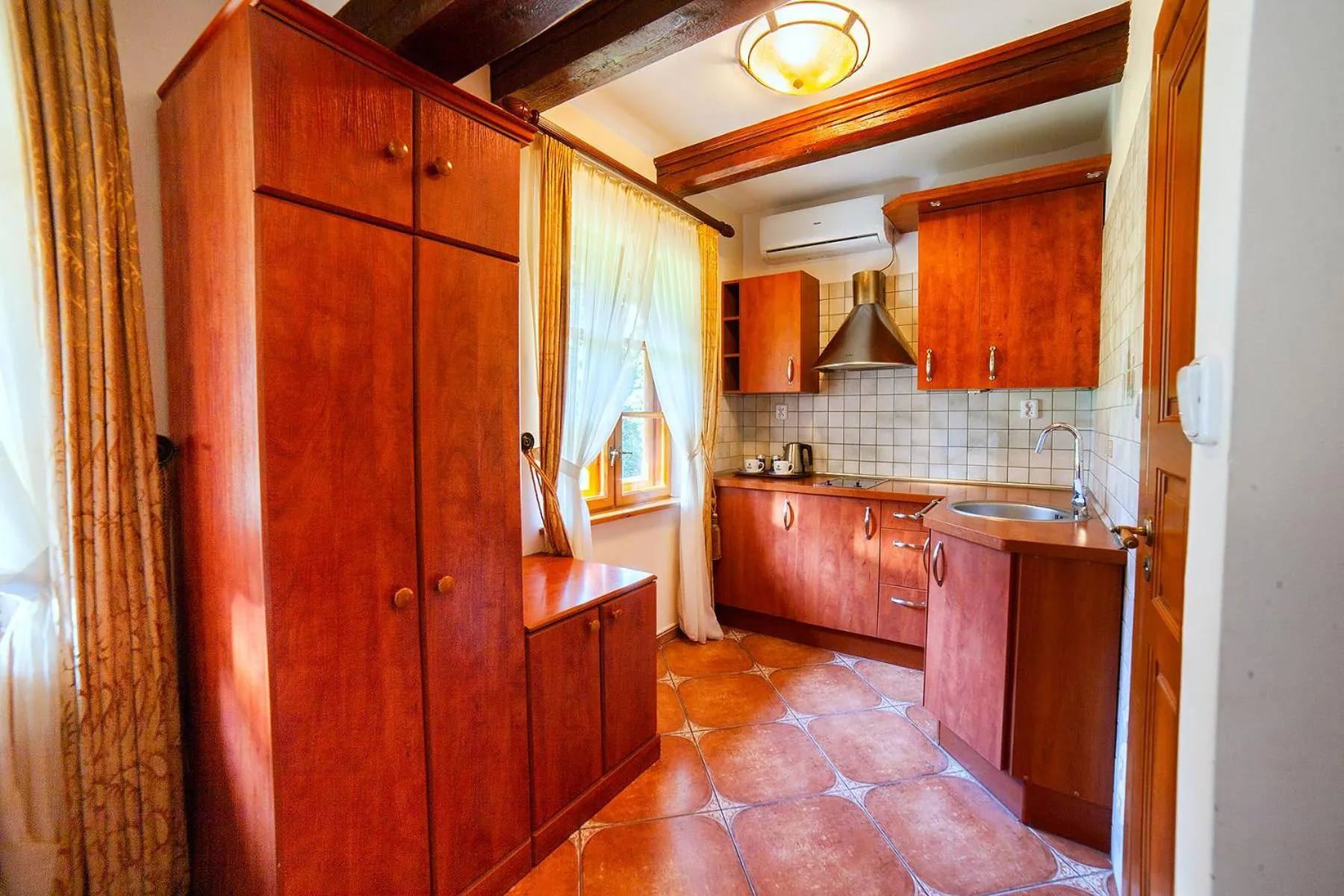 Kitchen or kitchenette in Hotel Dworek Wapionka