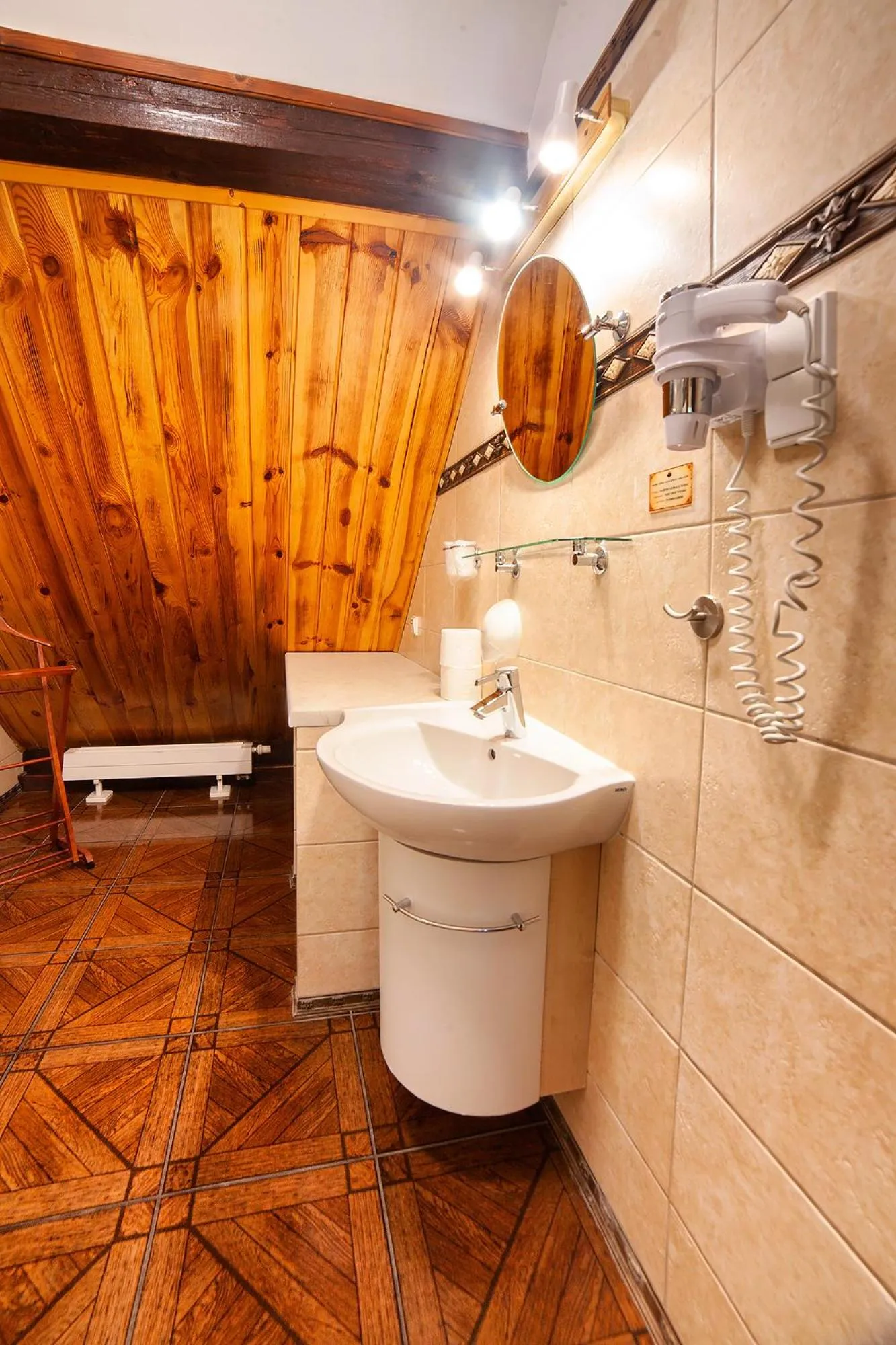 Bathroom in Hotel Dworek Wapionka