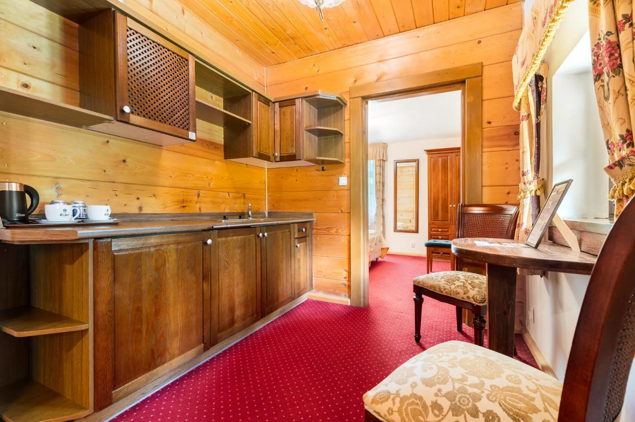 Kitchen or kitchenette in Hotel Dworek Wapionka