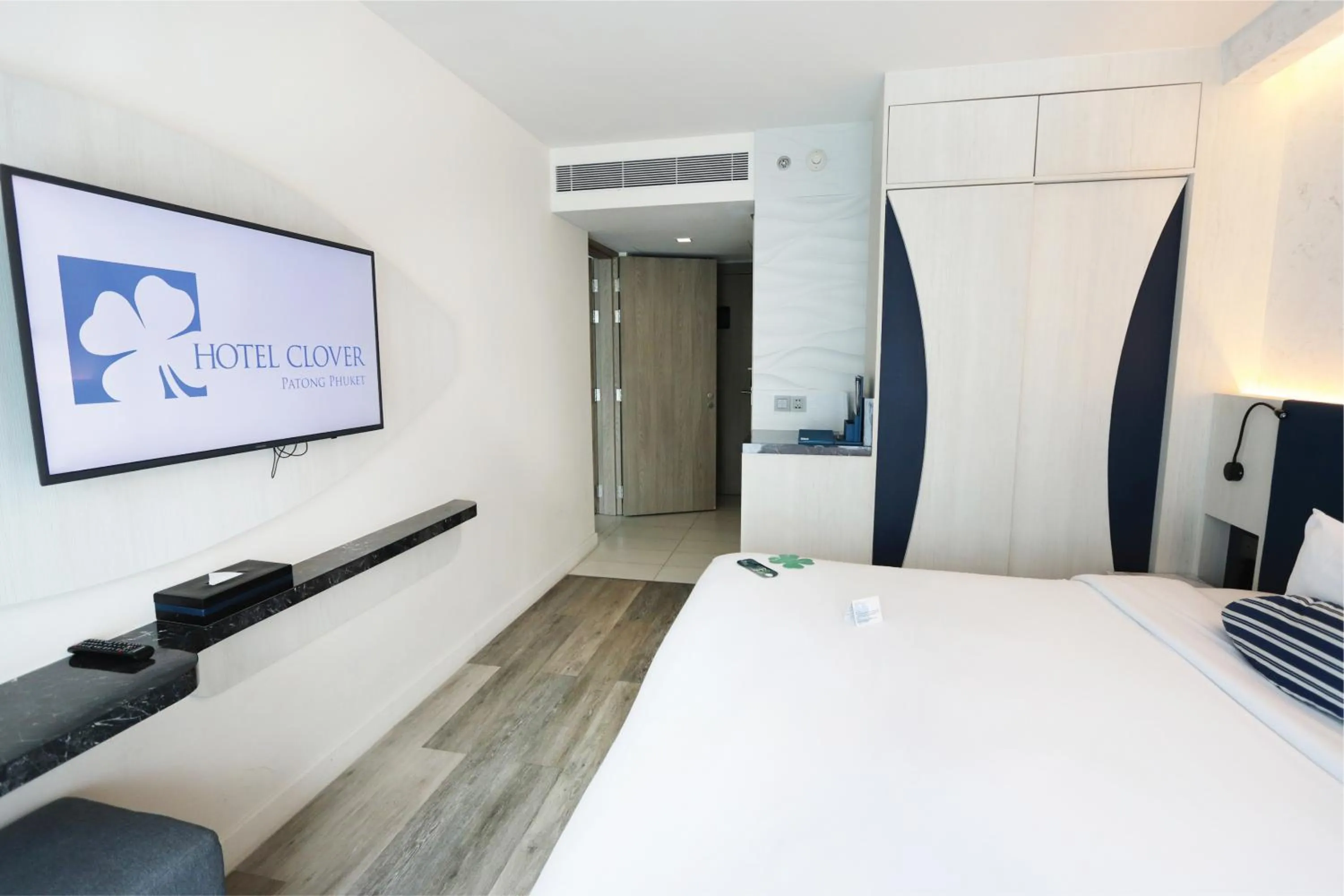 TV and multimedia, Bed in Hotel Clover Patong Phuket - SHA Plus