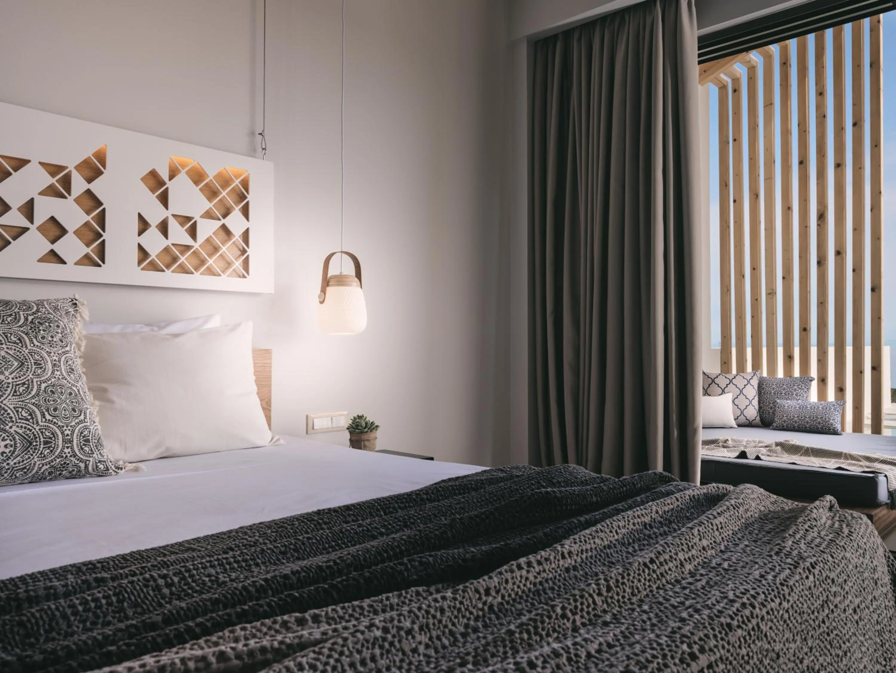 Bed in Hotel St.John Suites Adults Only