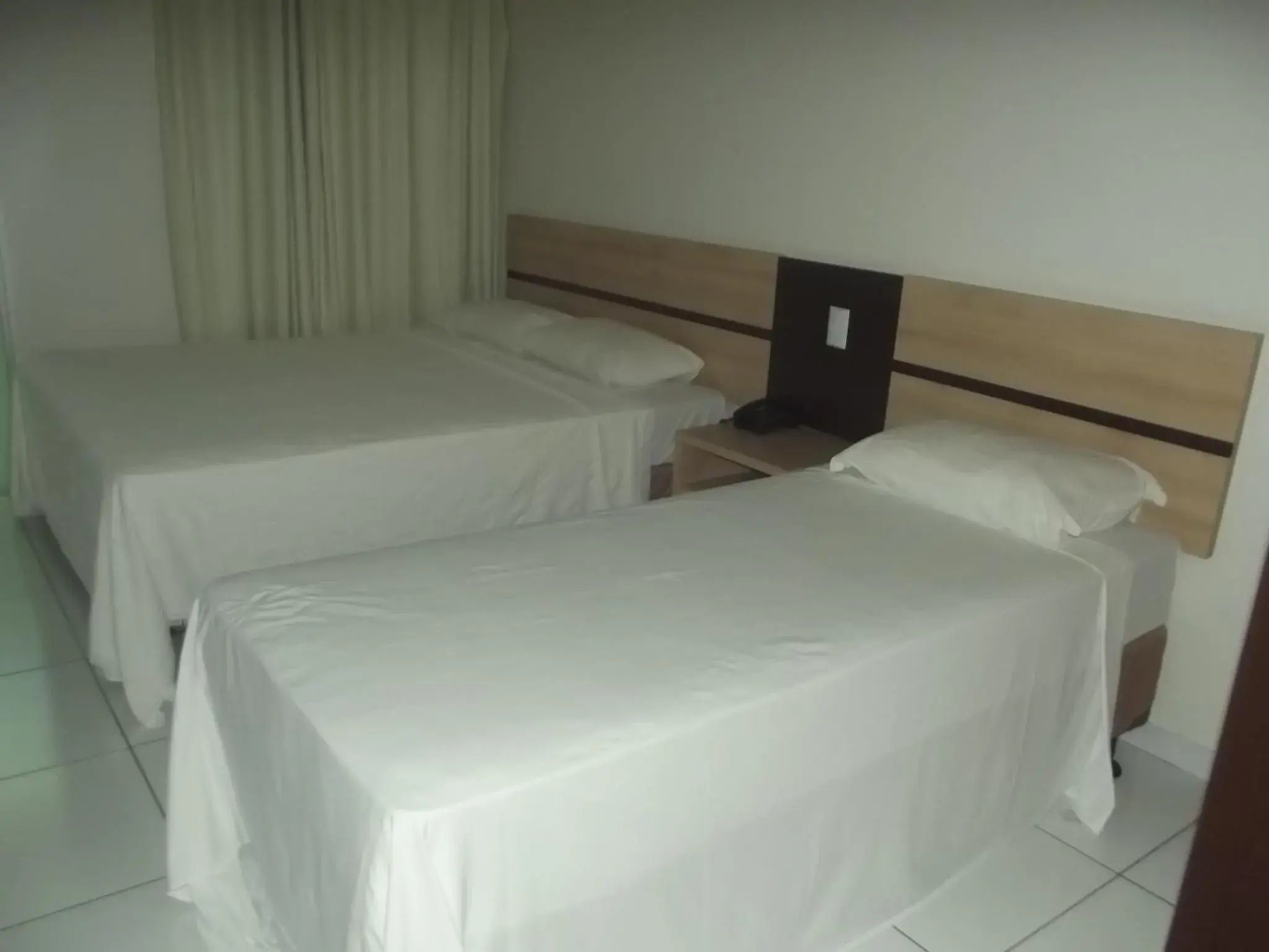 Executive Triple Room in Hotel Estrela Palmas Executive Triple Room in Hotel Estrela Palmas