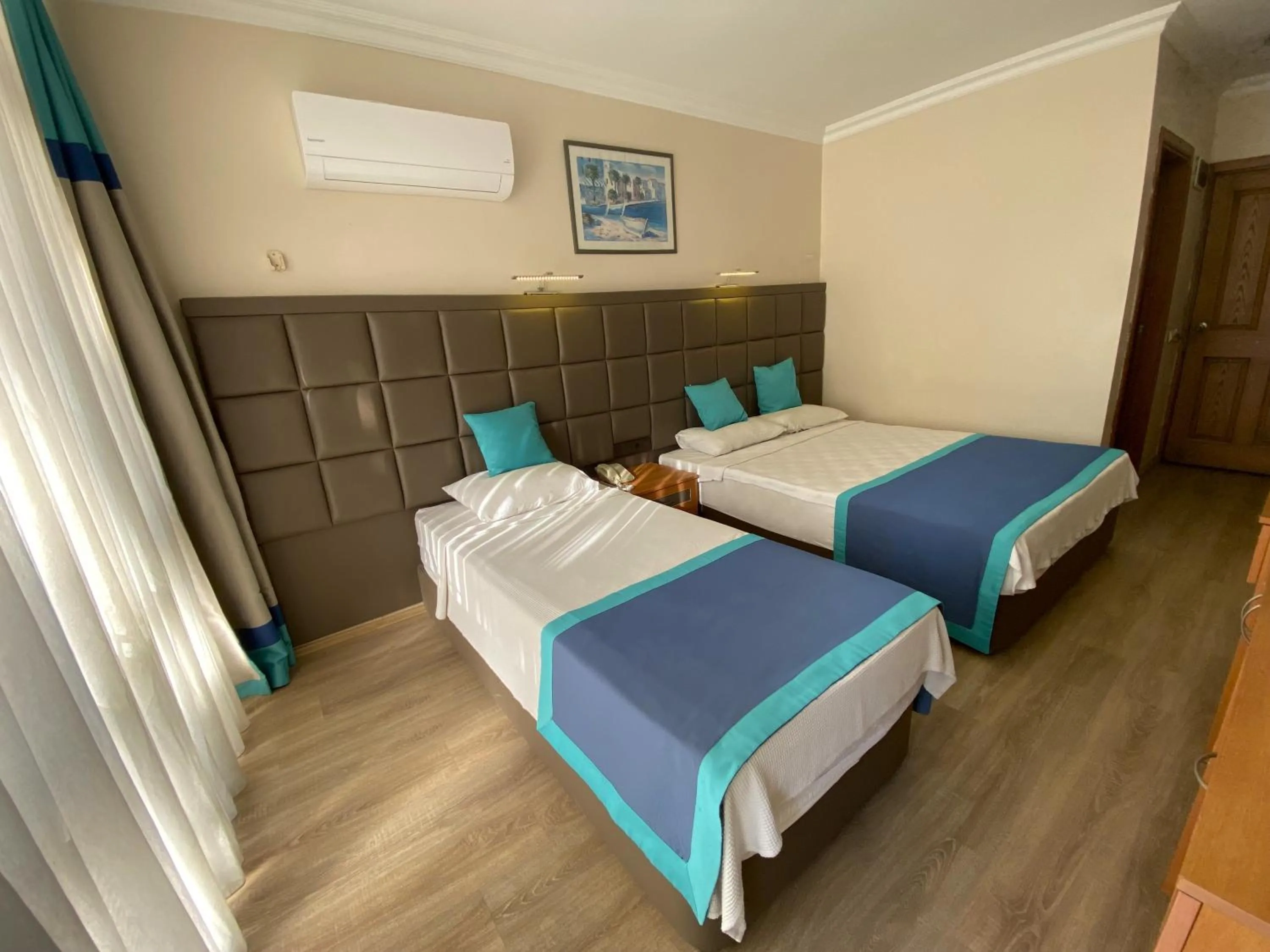 Photo of the whole room, Bed in Prima Hotel