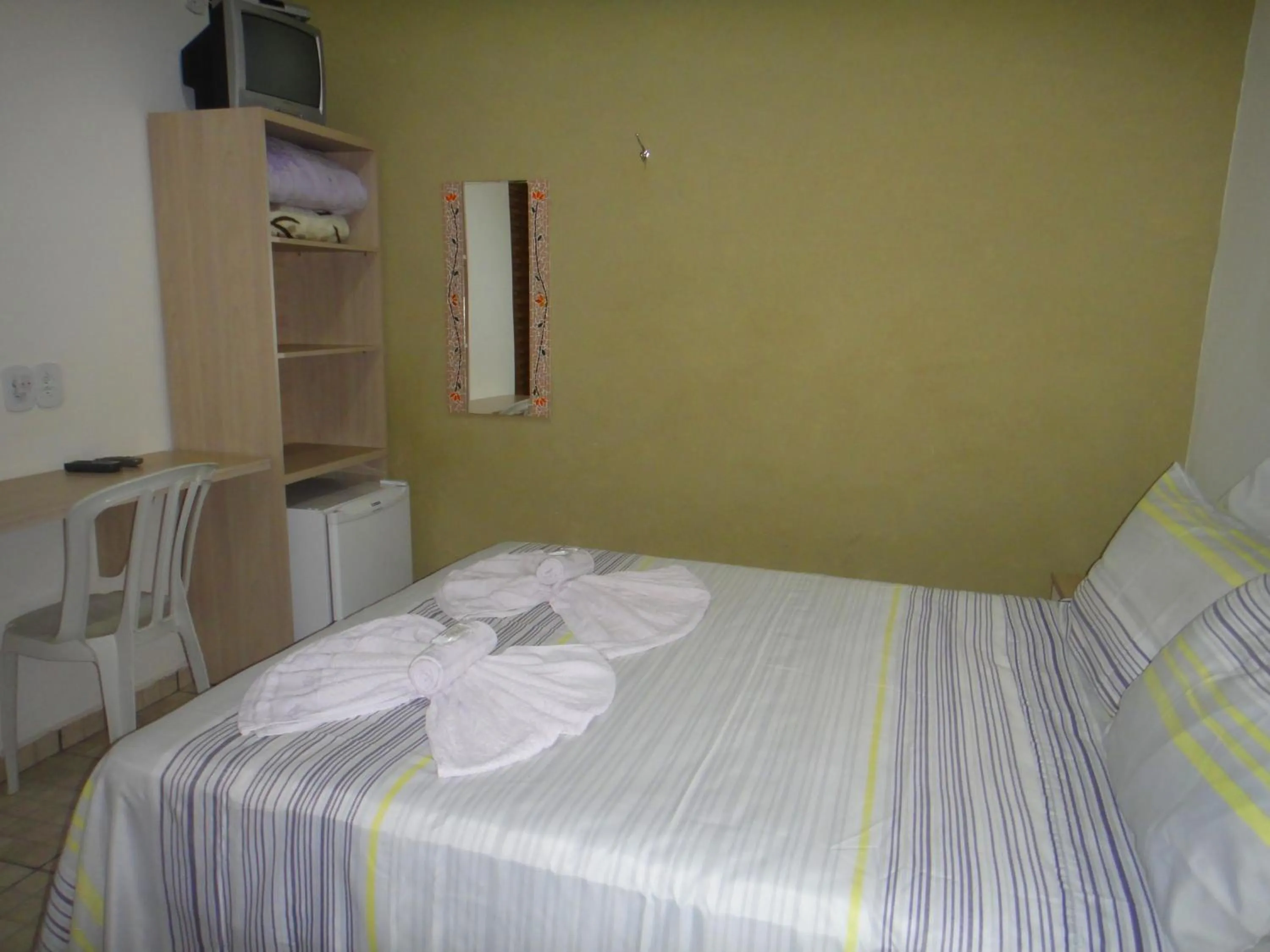 Bed in Pousada Jubaia