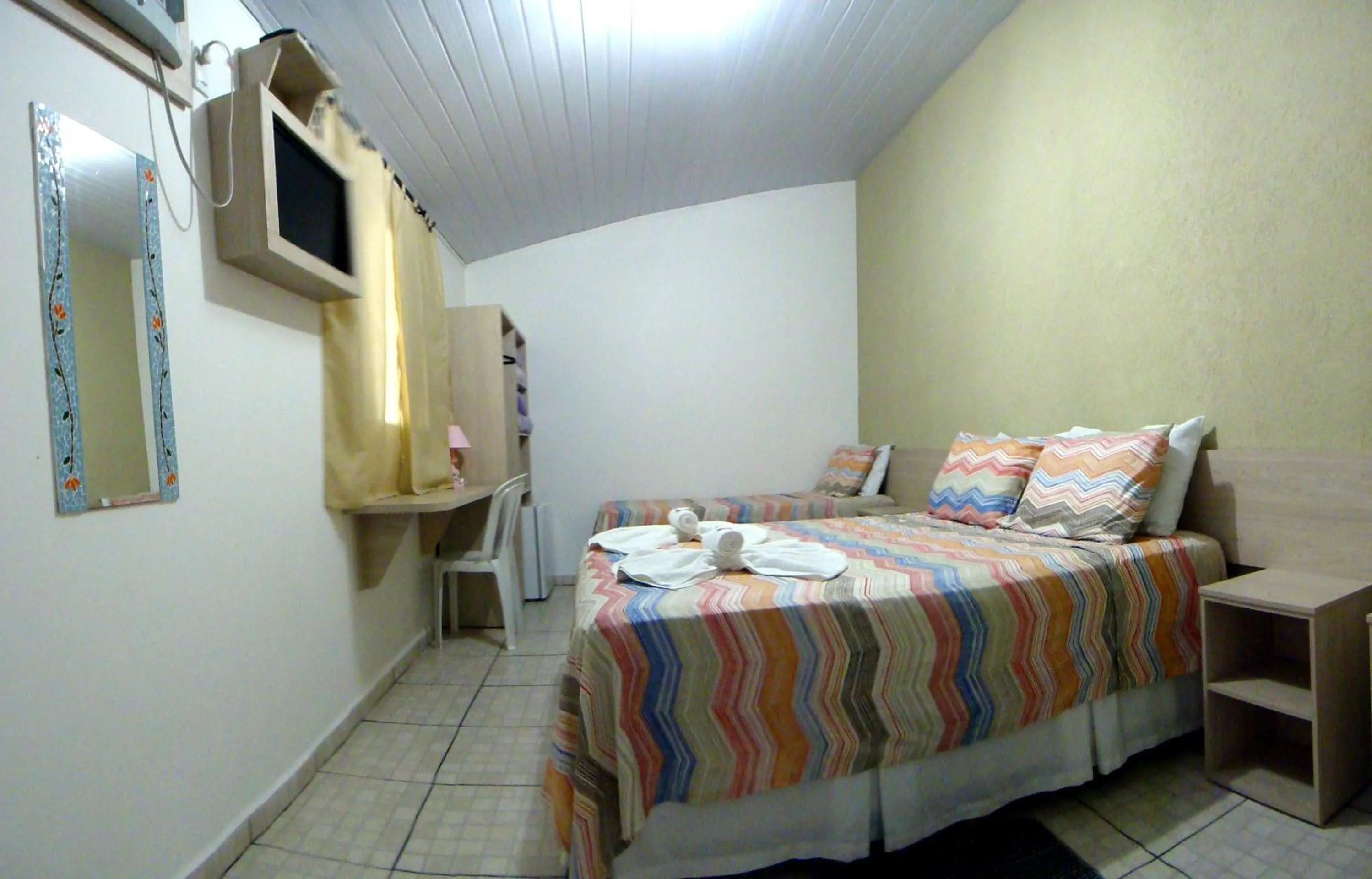 Bed in Pousada Jubaia