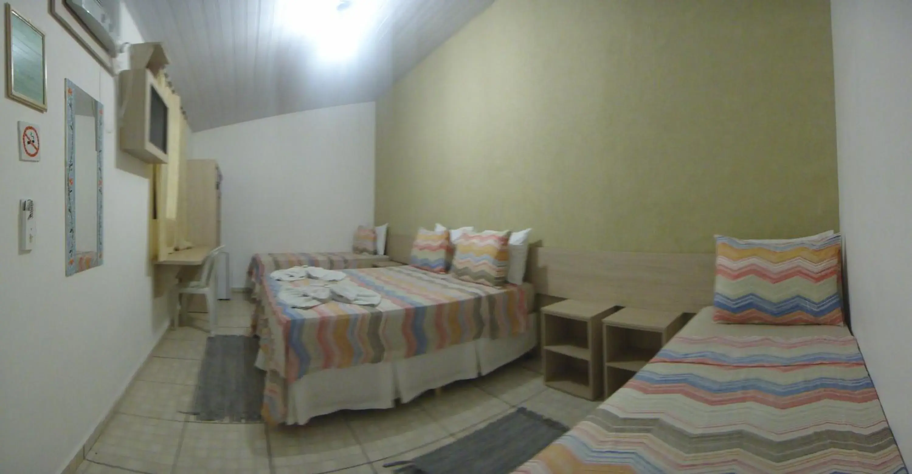 Deluxe Quadruple Room in Pousada Jubaia Deluxe Quadruple Room in Pousada Jubaia