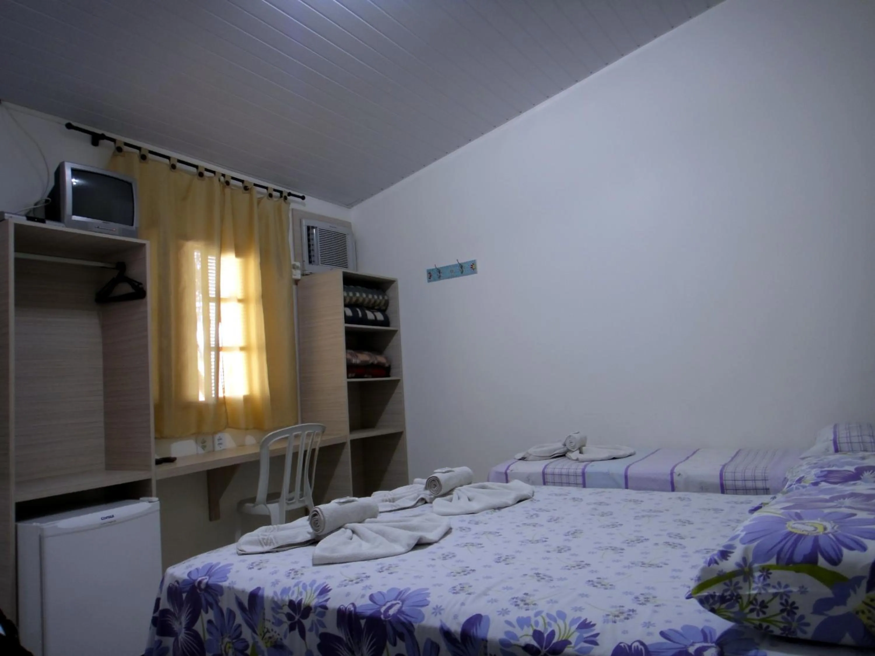 Bed in Pousada Jubaia