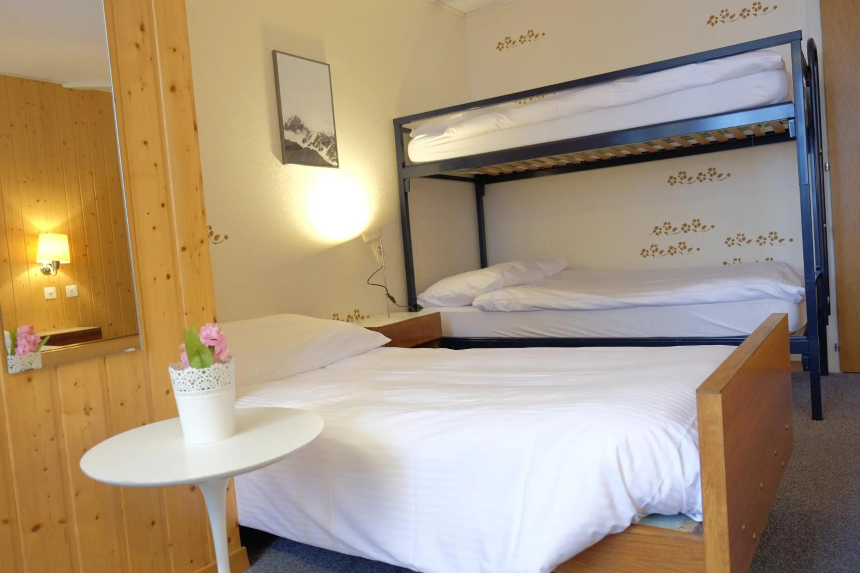 Bed in Guest Rooms with a great view at Residence Brunner