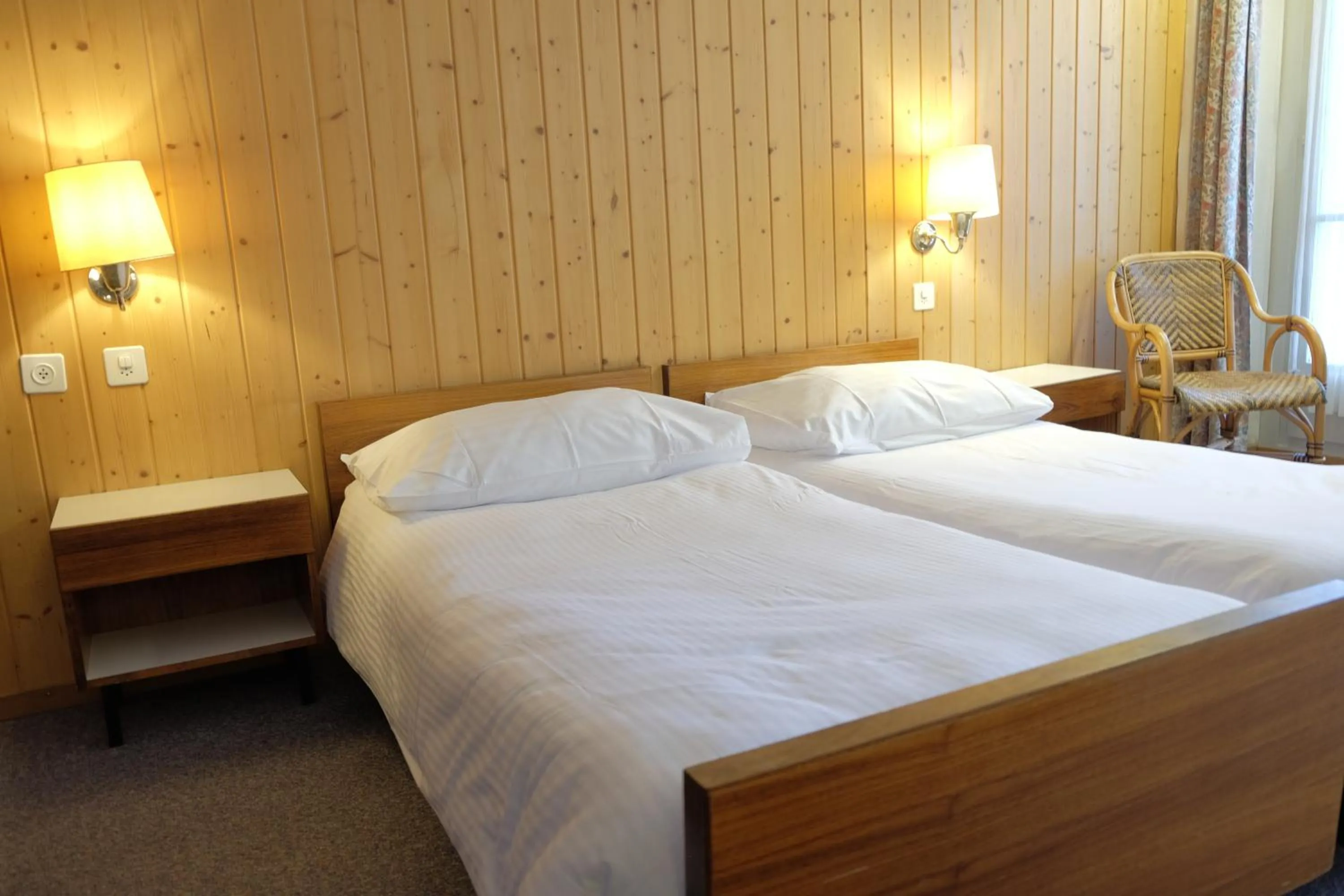 Bed in Guest Rooms with a great view at Residence Brunner