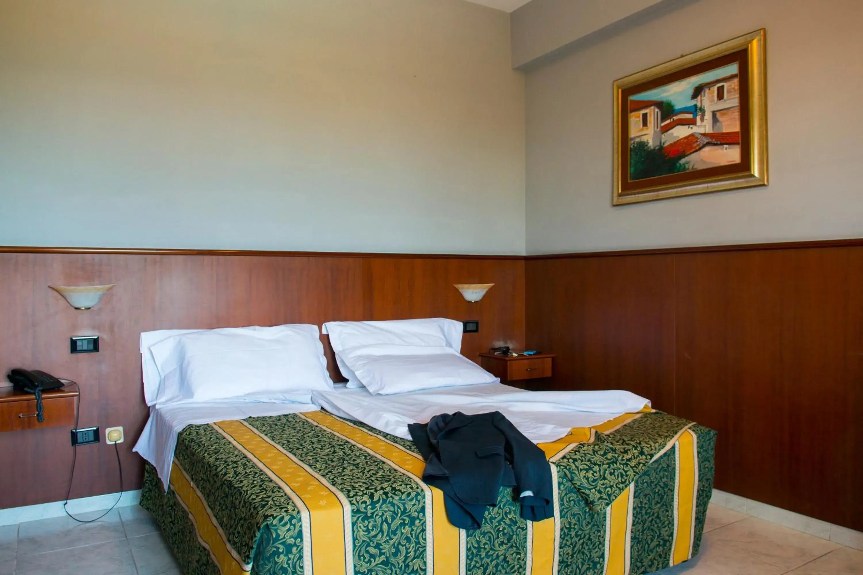 Bed in Hotel Dei Pini Bed in Hotel Dei Pini