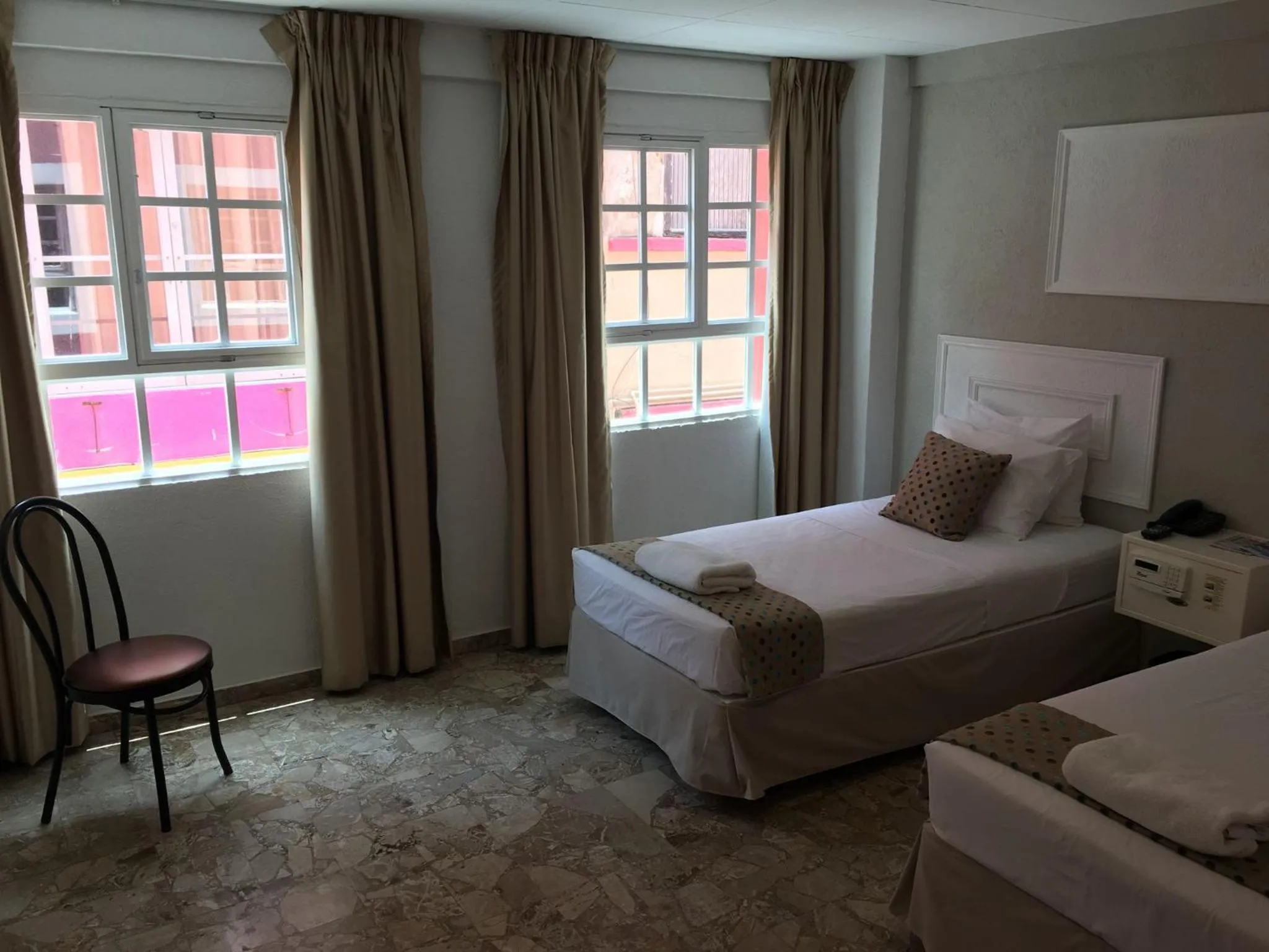 Bed in San Marco Hotel Curacao & Casino