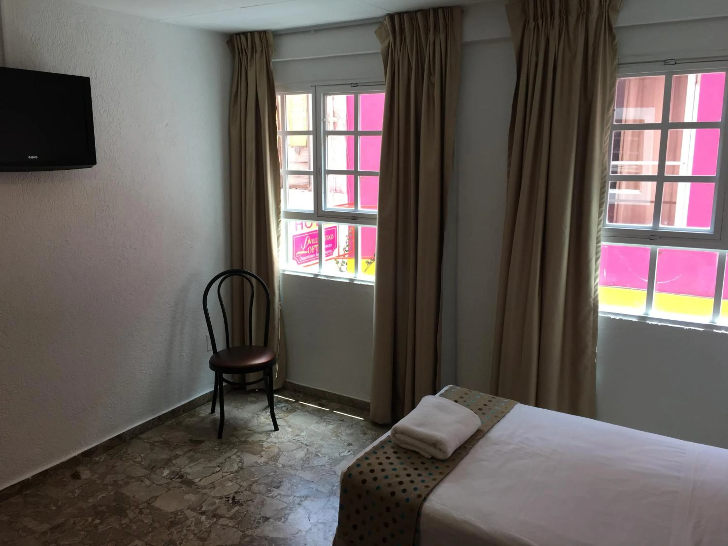 City view, Bed in San Marco Hotel Curacao & Casino