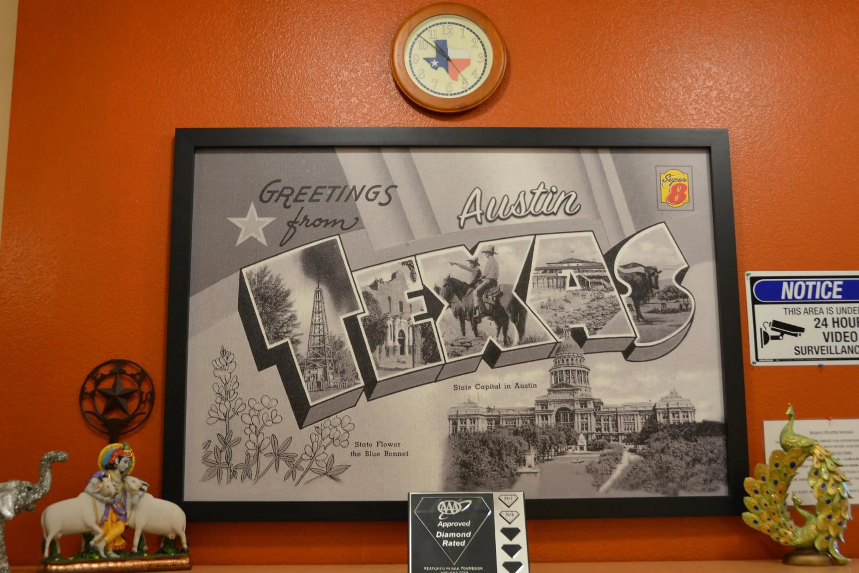 Property logo or sign in Super 8 by Wyndham Austin/Airport South