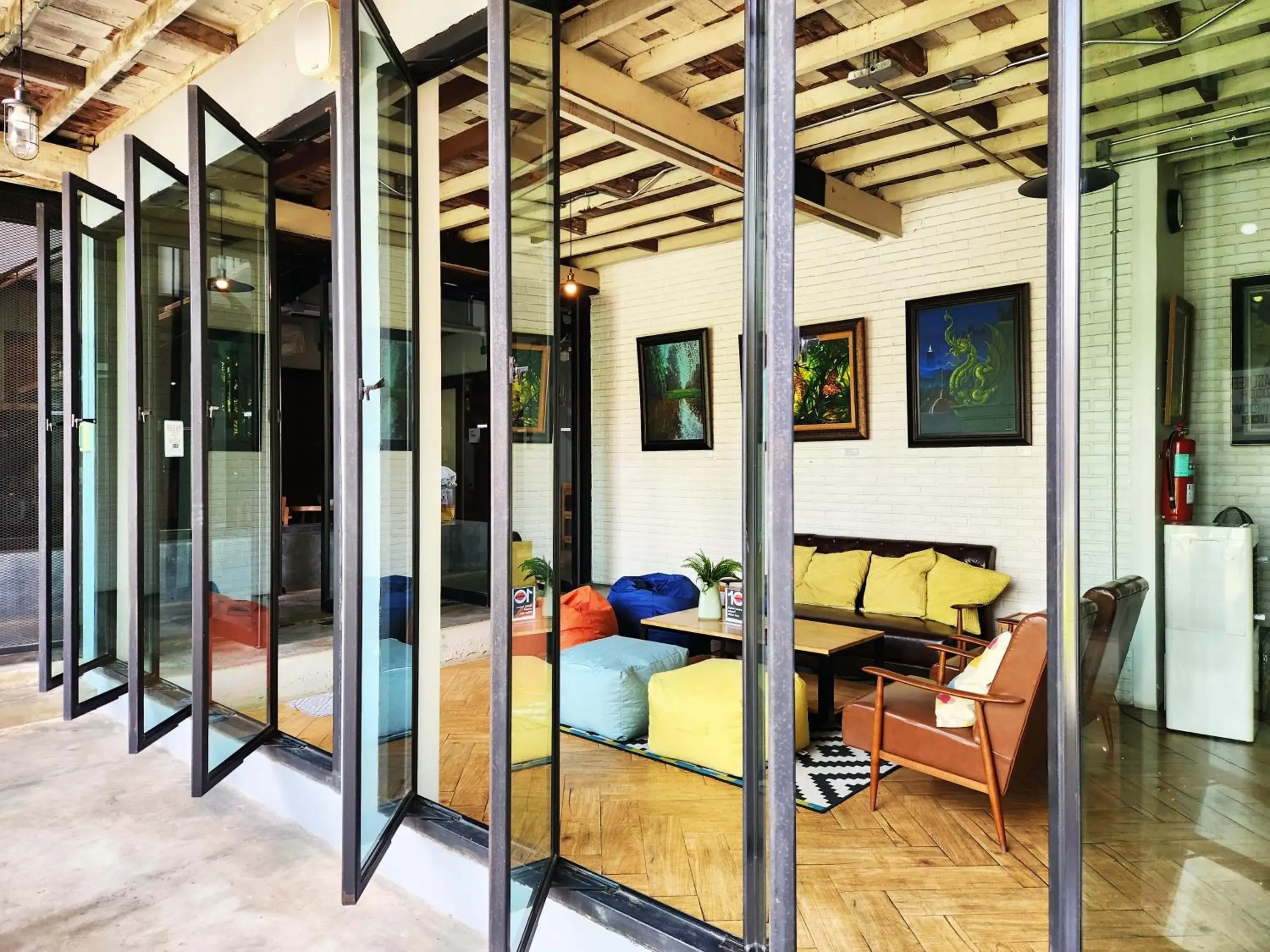 Living room in Baan Mai Kradan Hostel Chiang Rai Living room in Baan Mai Kradan Hostel Chiang Rai