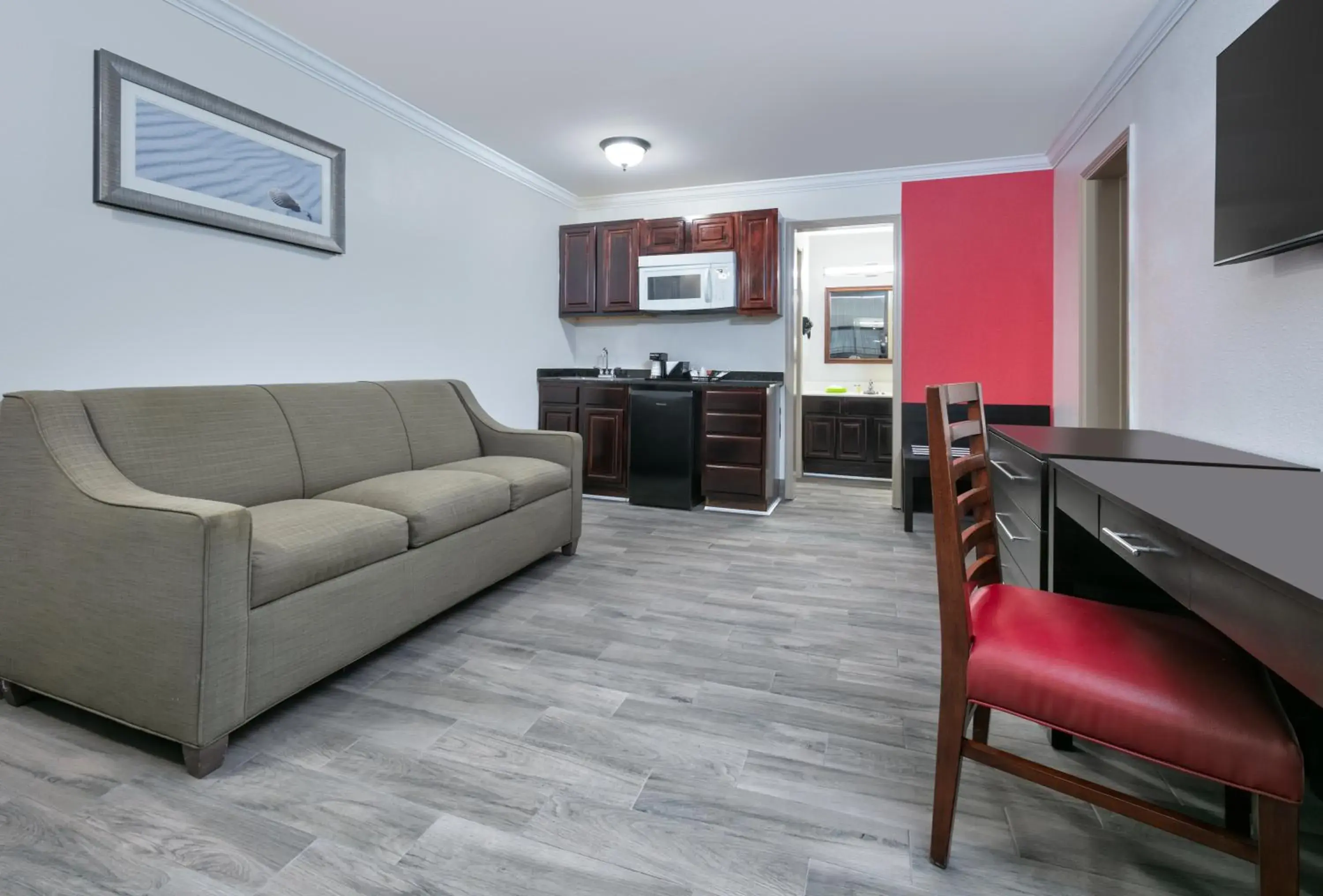 Living room in Ramada by Wyndham Diamondhead I-10 Gulfport Living room in Ramada by Wyndham Diamondhead I-10 Gulfport