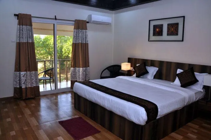 Bedroom, Bed in Exotica Beach Retreats Diveagar