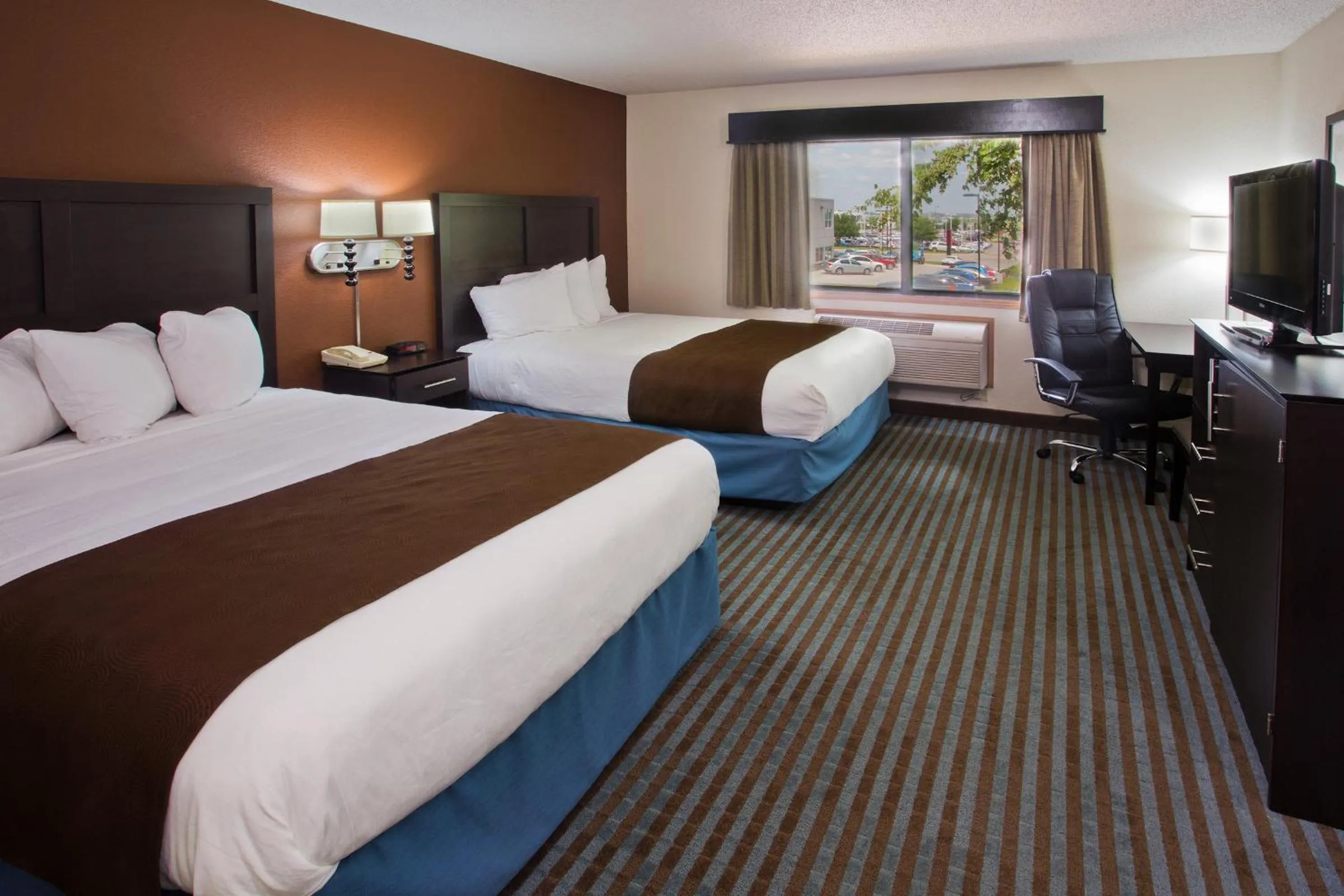 Bedroom, Bed in AmericInn by Wyndham Lincoln North