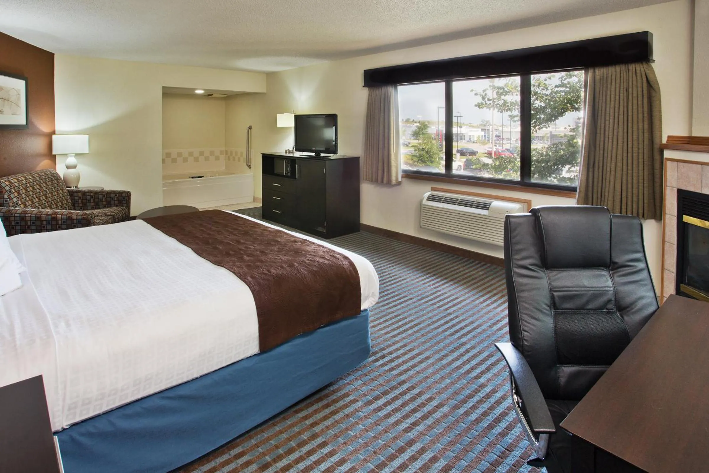 Bedroom, Bed in AmericInn by Wyndham Lincoln North