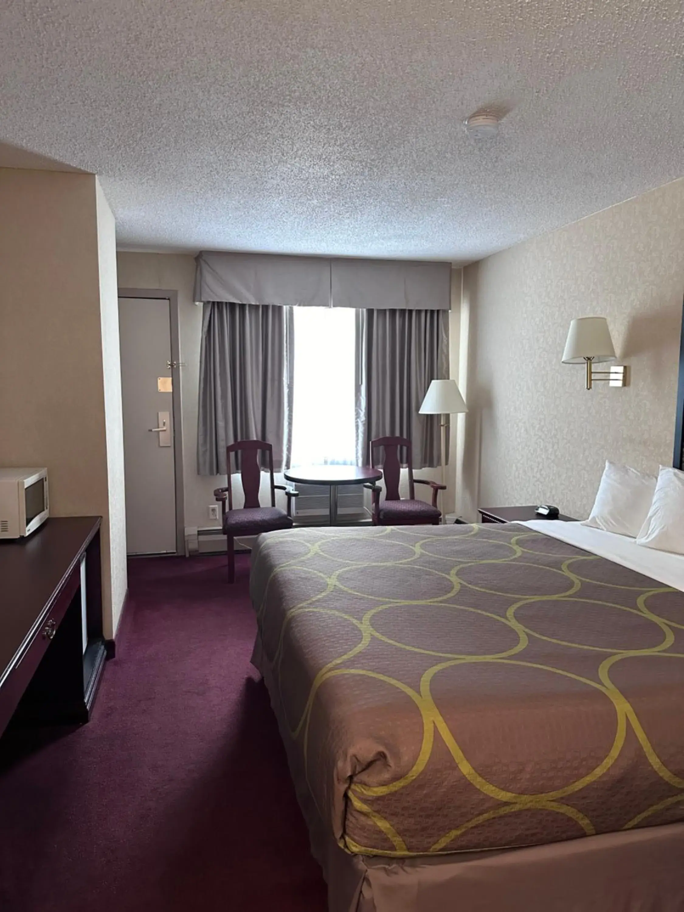 Bedroom, Bed in Super 8 by Wyndham Lethbridge Bedroom, Bed in Super 8 by Wyndham Lethbridge