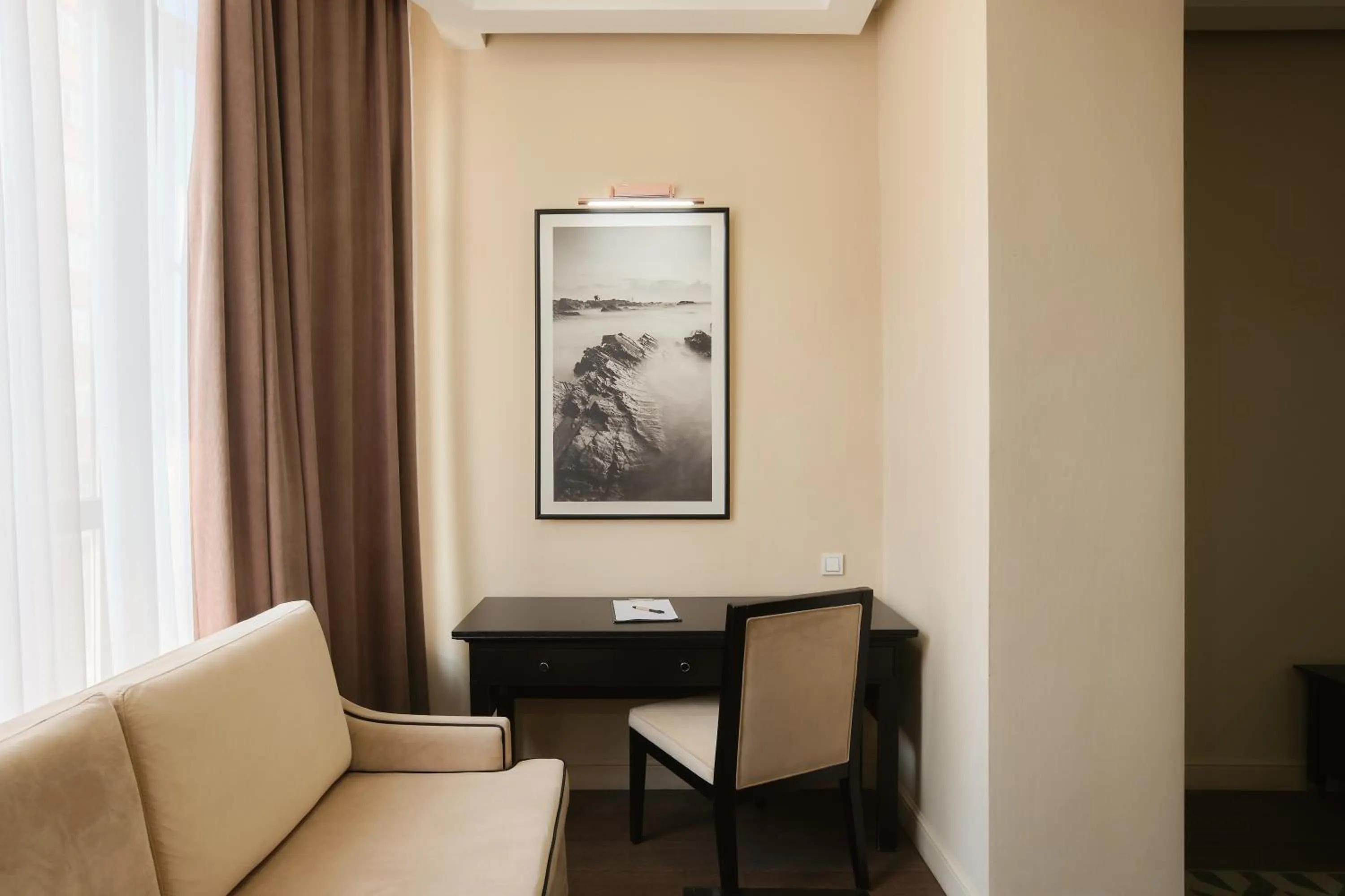 Seating area in Madison Ave Hotel Bishkek