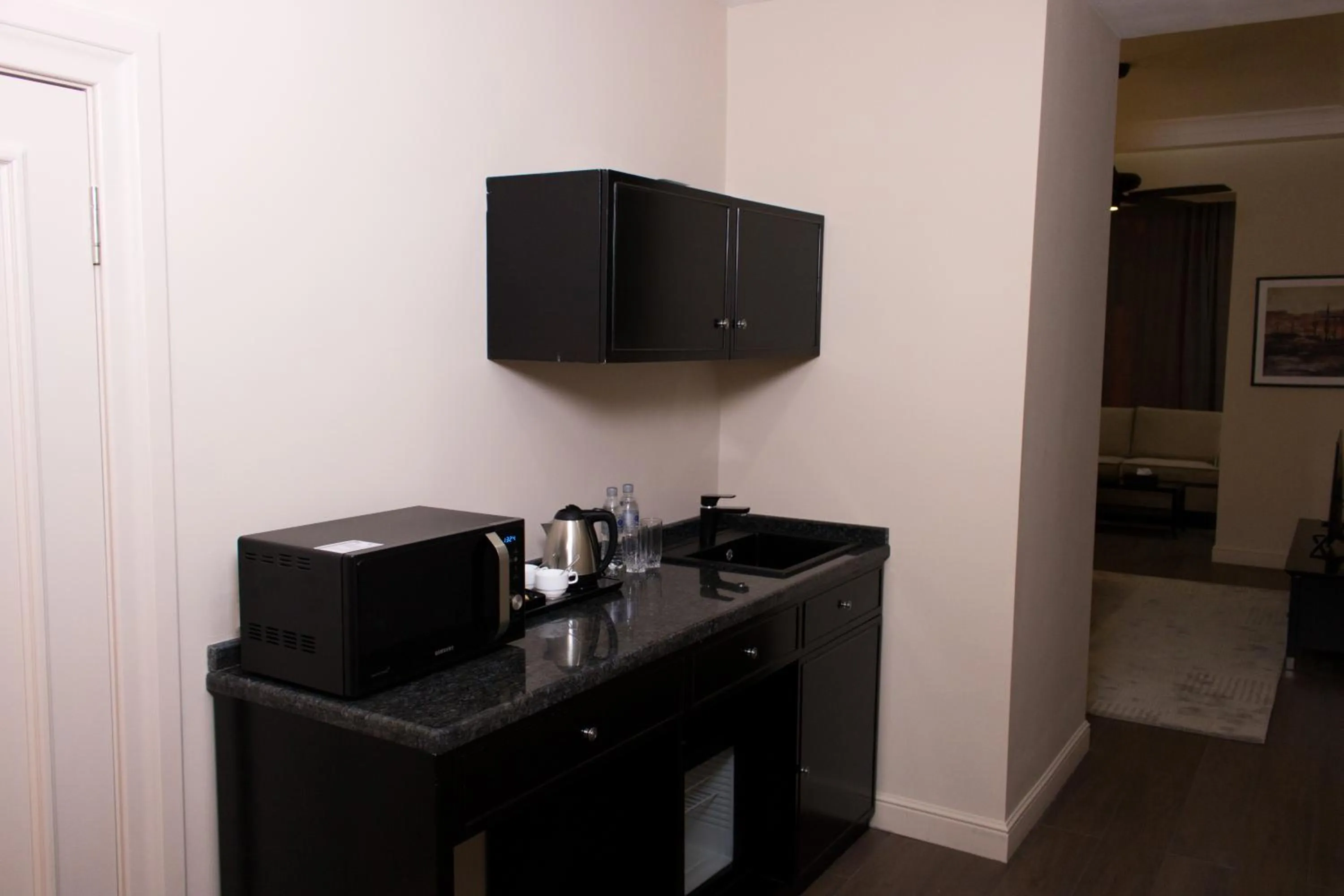 Kitchen or kitchenette in Madison Ave Hotel Bishkek