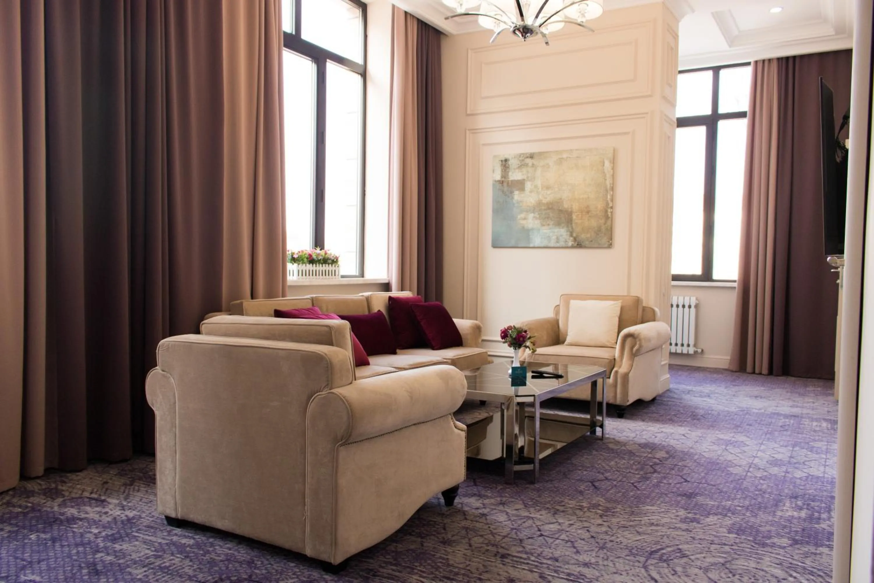 Living room in Madison Ave Hotel Bishkek