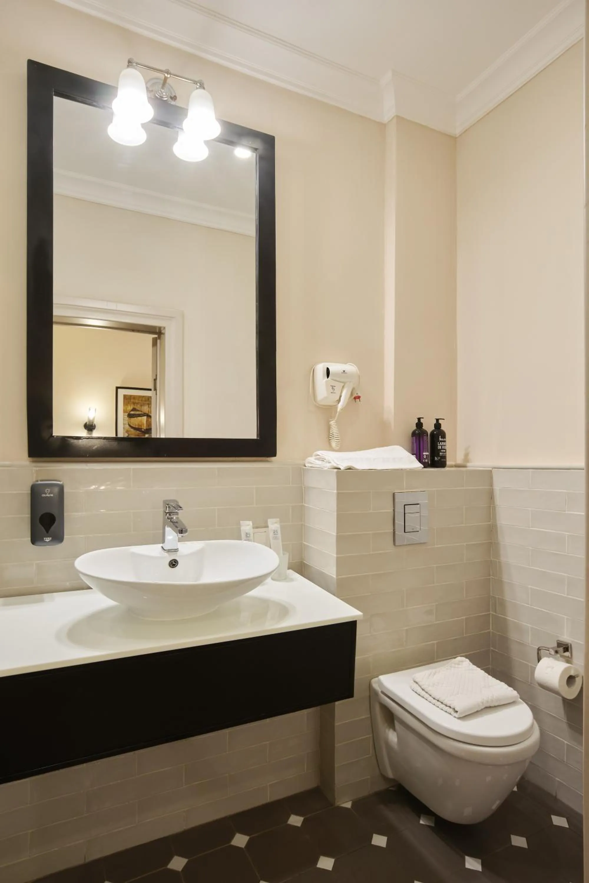 Toilet in Madison Ave Hotel Bishkek