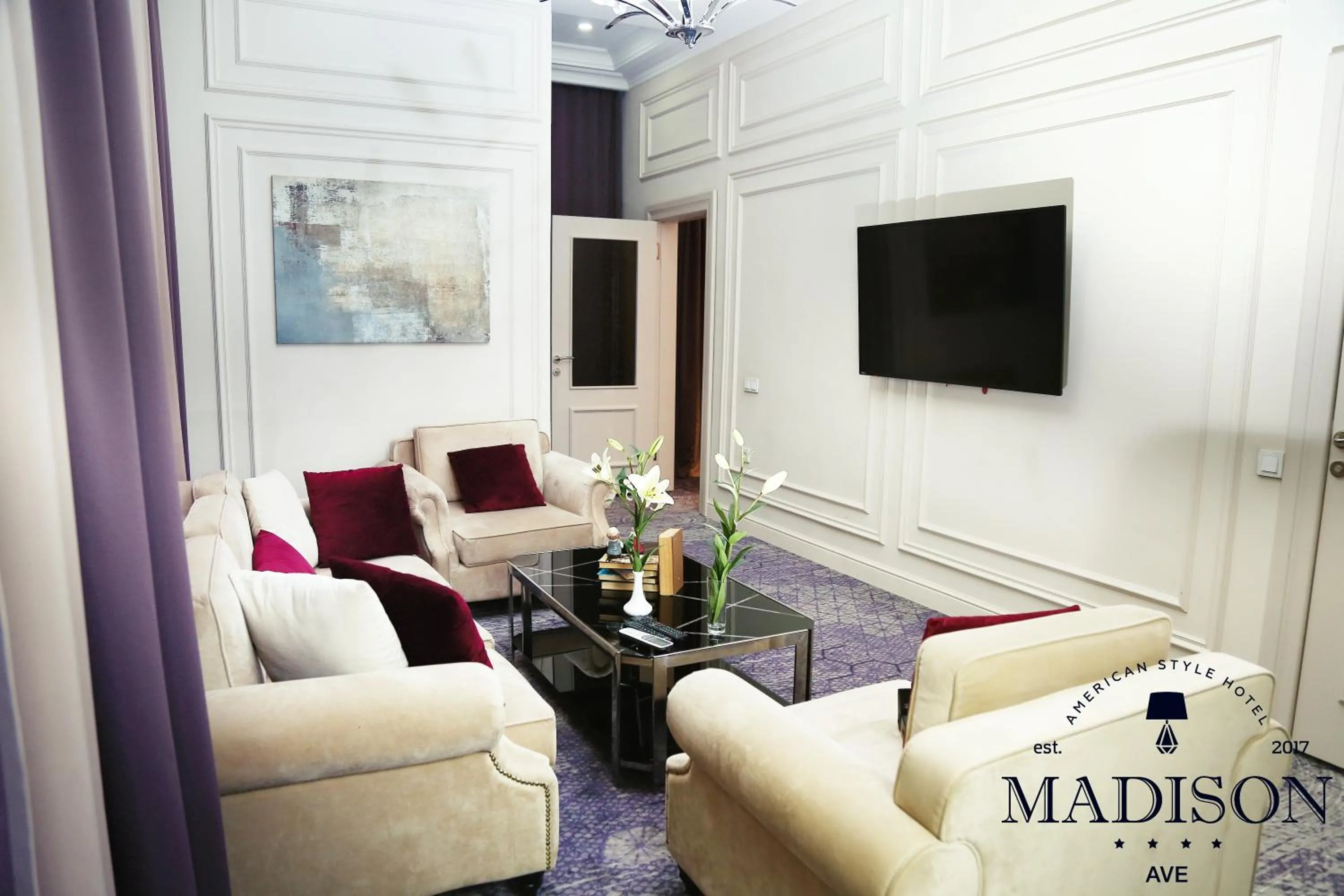 Living room in Madison Ave Hotel Bishkek