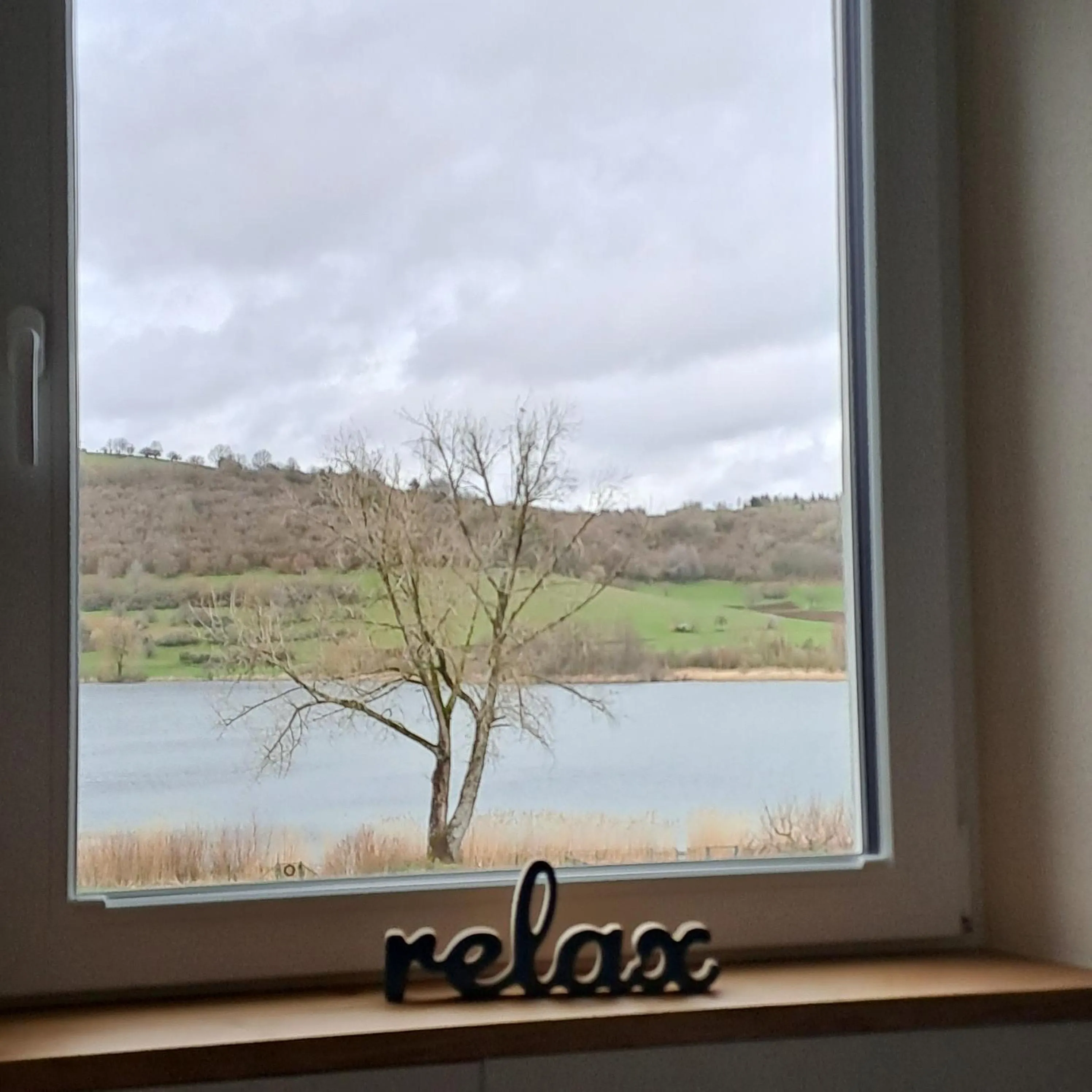 Lake view in Hotel-Ferienwohnungen Cafe Maarblick