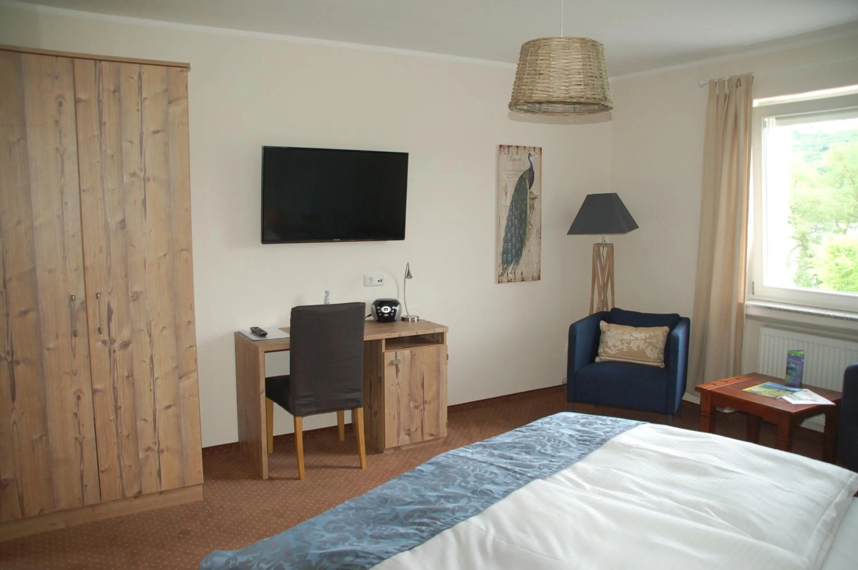 Photo of the whole room, Bed in Hotel-Ferienwohnungen Cafe Maarblick