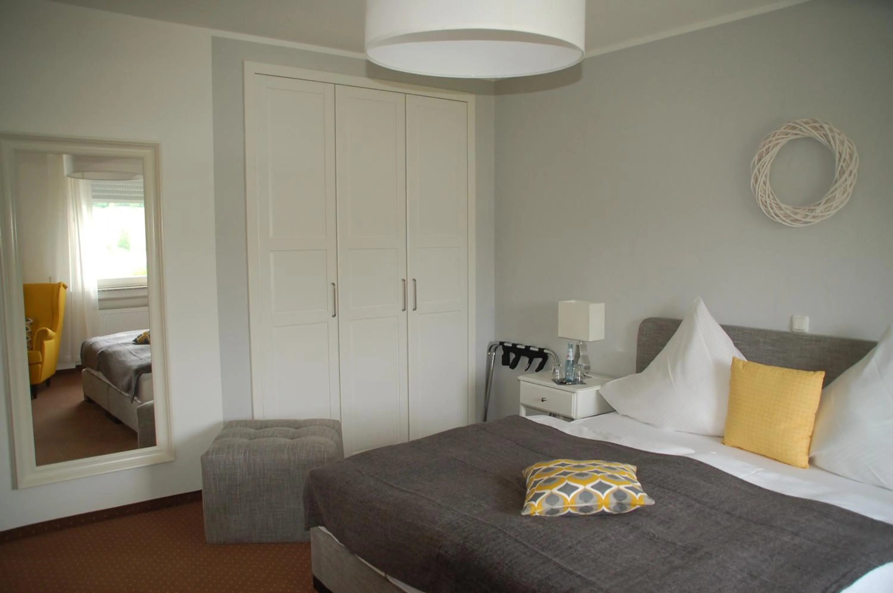 Bedroom, Bed in Hotel-Ferienwohnungen Cafe Maarblick