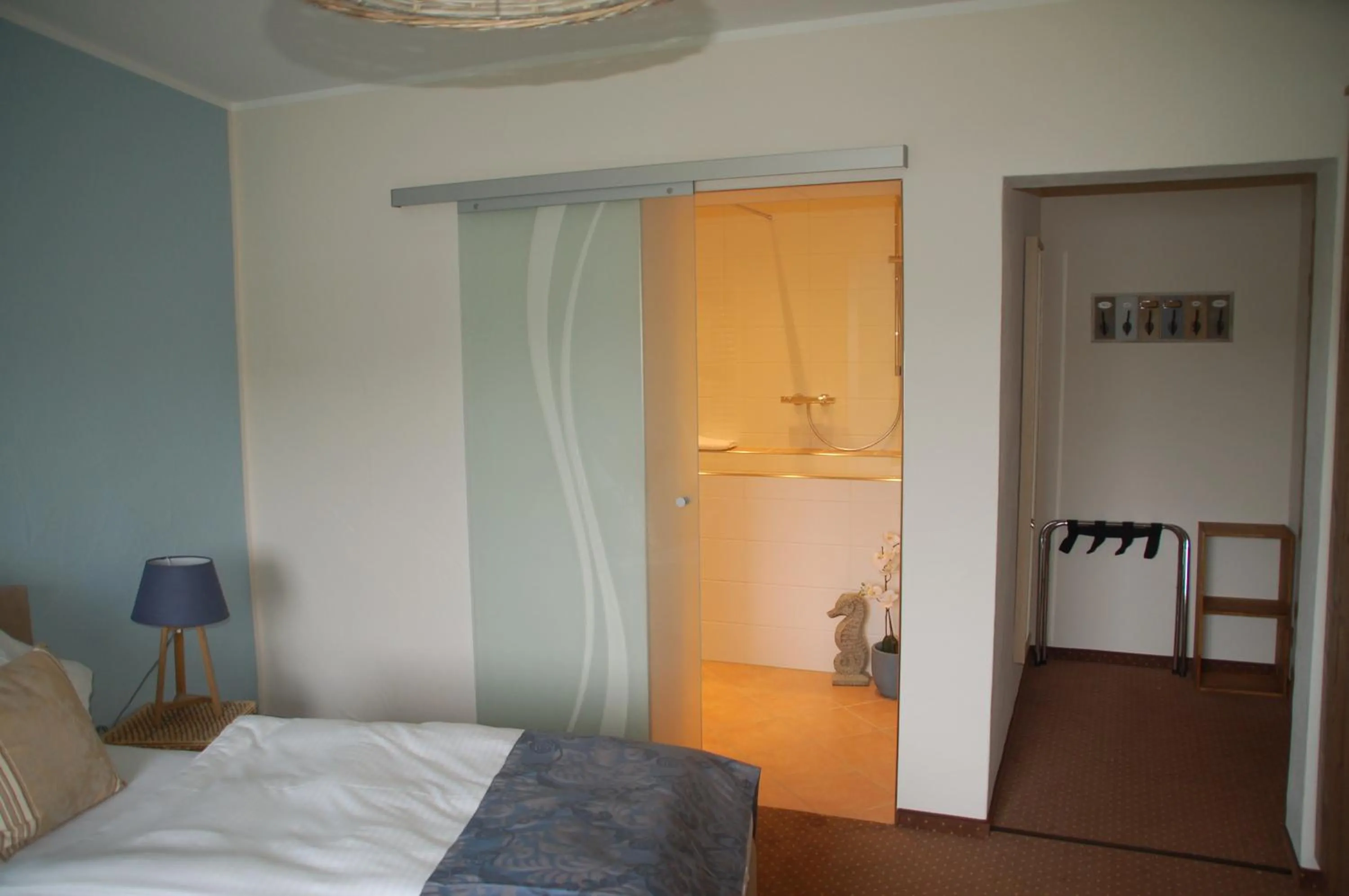 Photo of the whole room, Bed in Hotel-Ferienwohnungen Cafe Maarblick