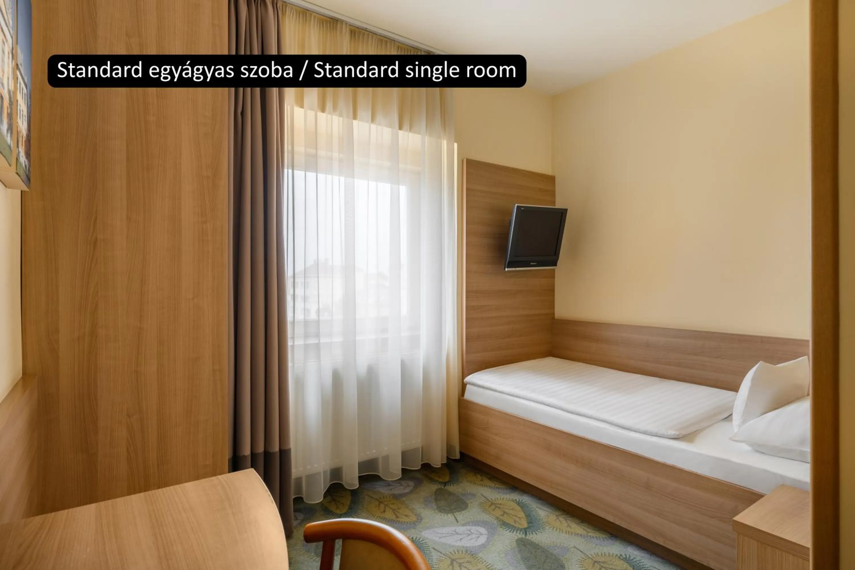 Bed in Aranyhomok Hotel Business & Relax